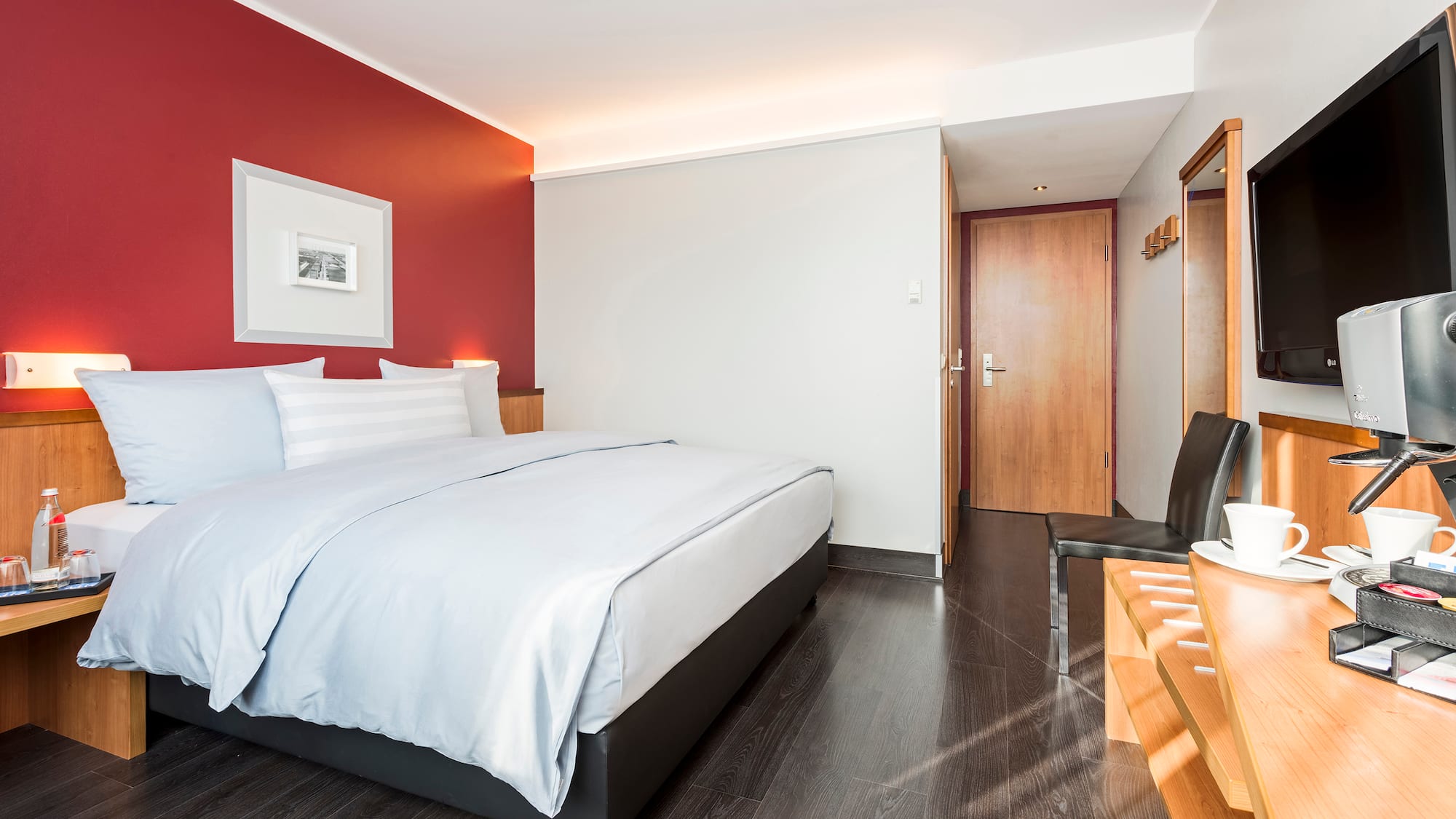 a room with a bed and a chair