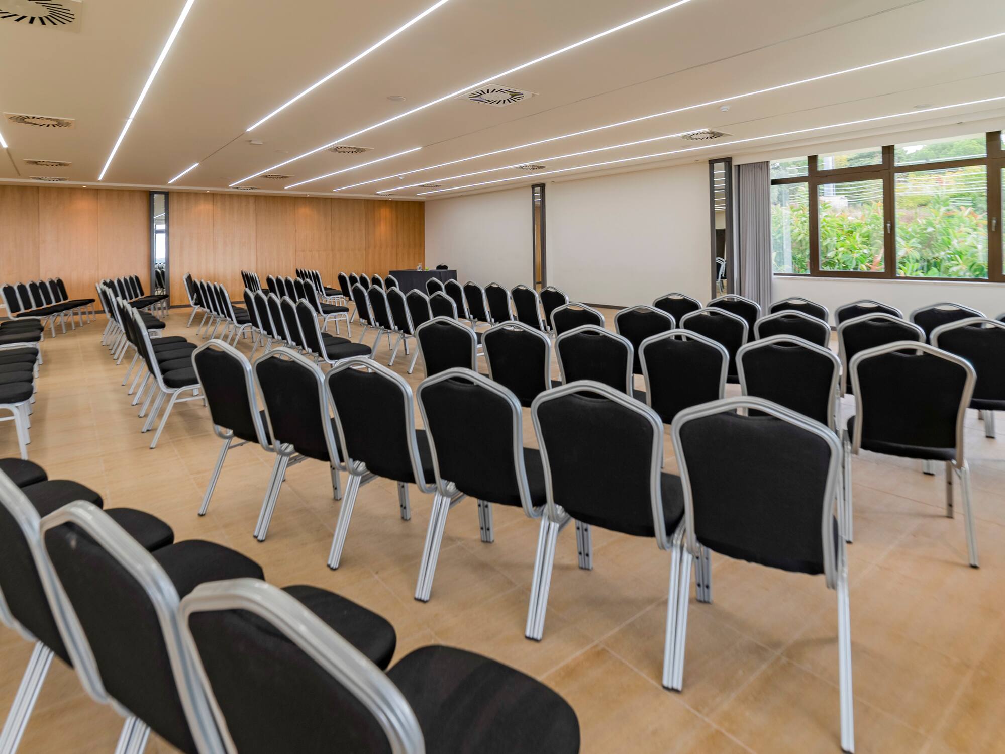 a room with rows of chairs