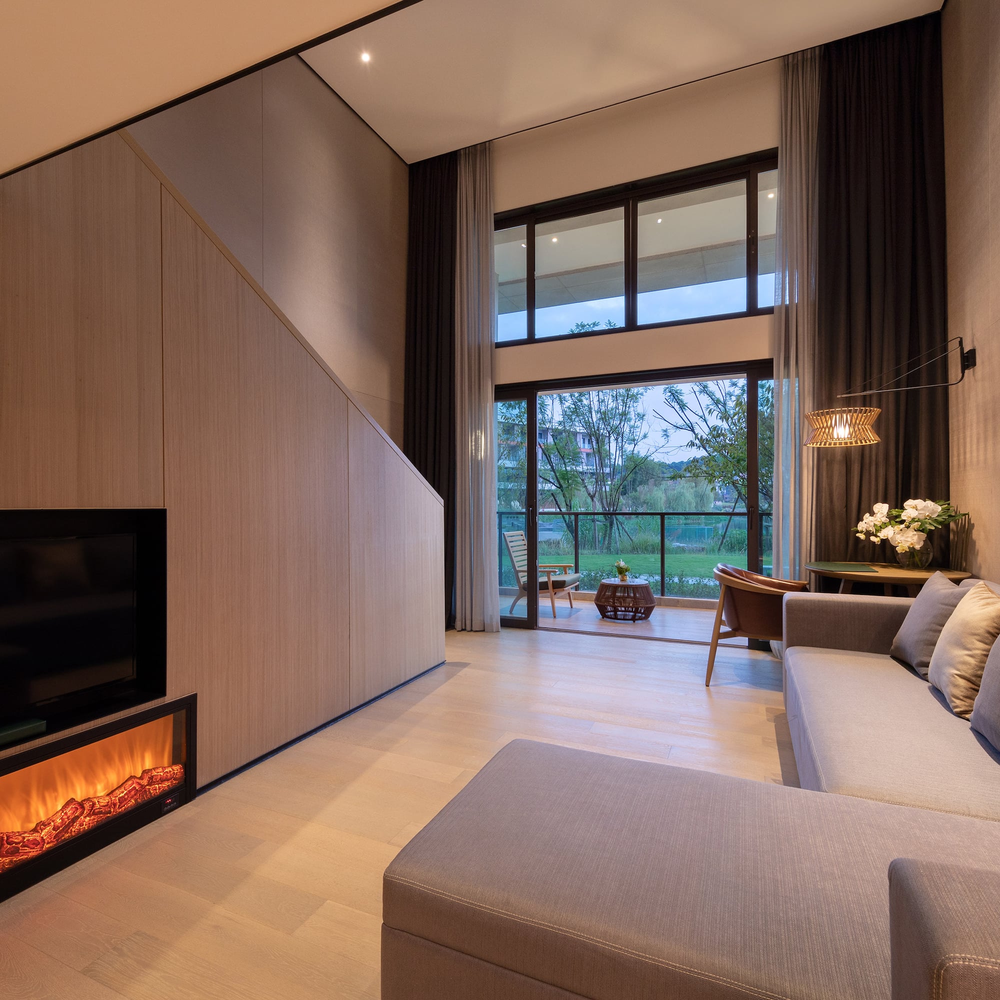 a living room with a fireplace and a couch