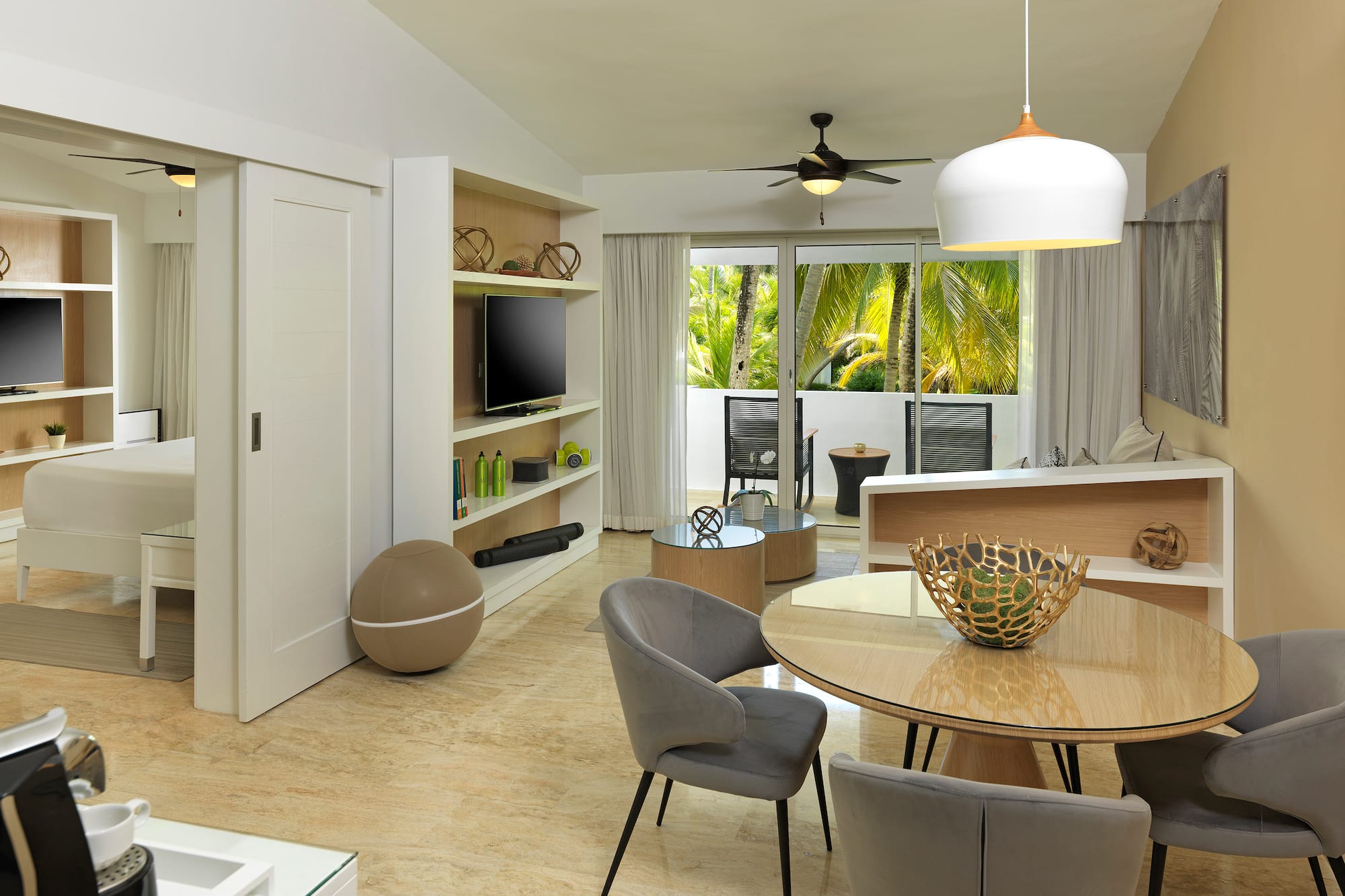 a room with a table and chairs