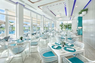 a room with tables and chairs