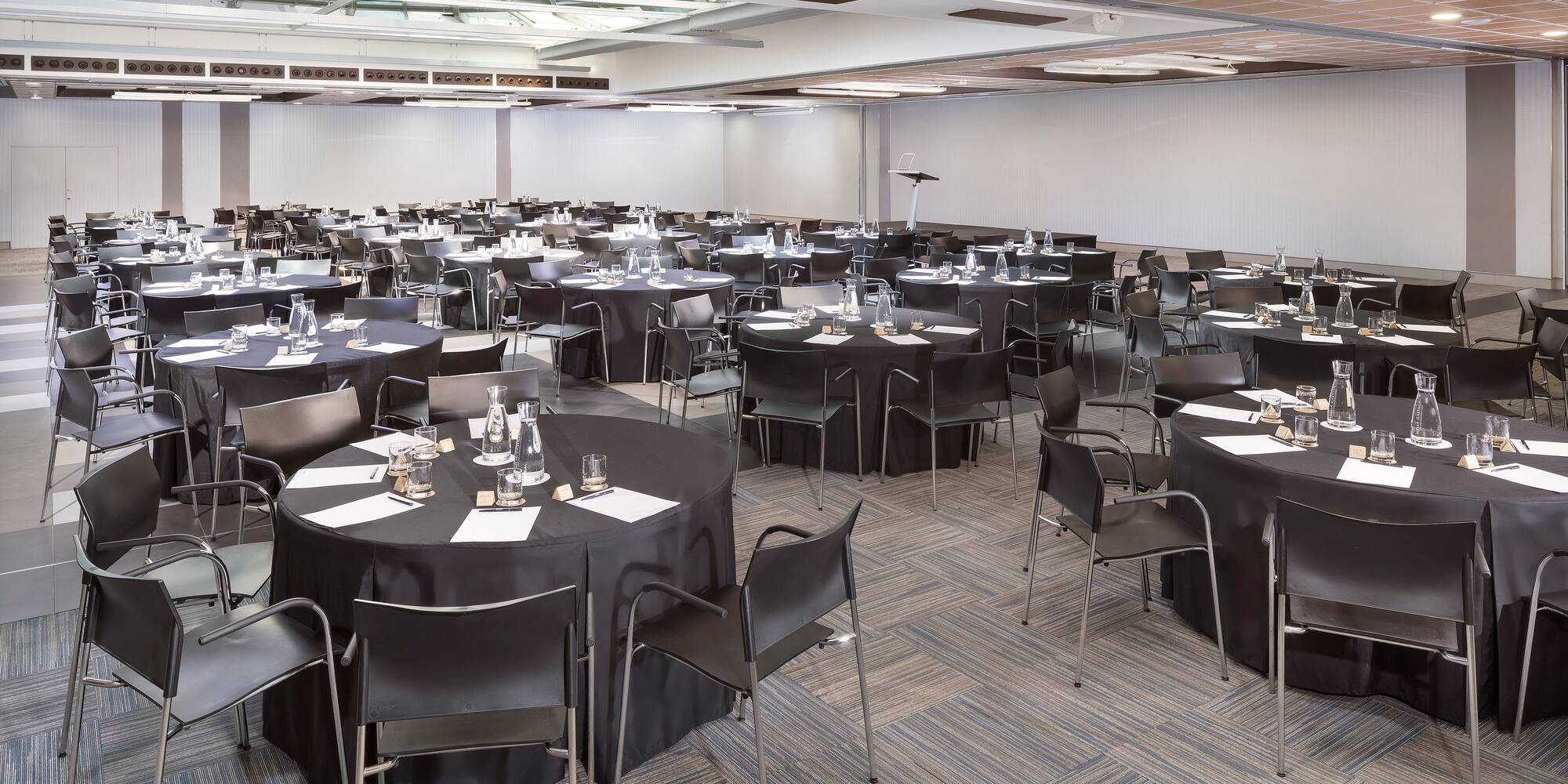 a room with tables and chairs