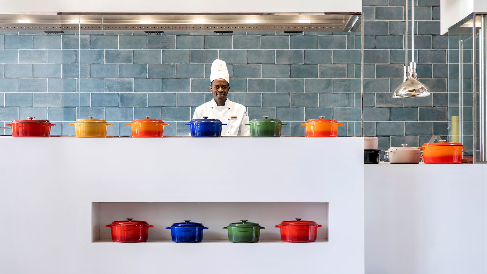 a chef standing in a kitchen