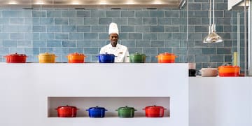 a chef standing in a kitchen