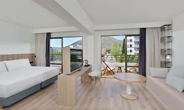 a room with a television and a table