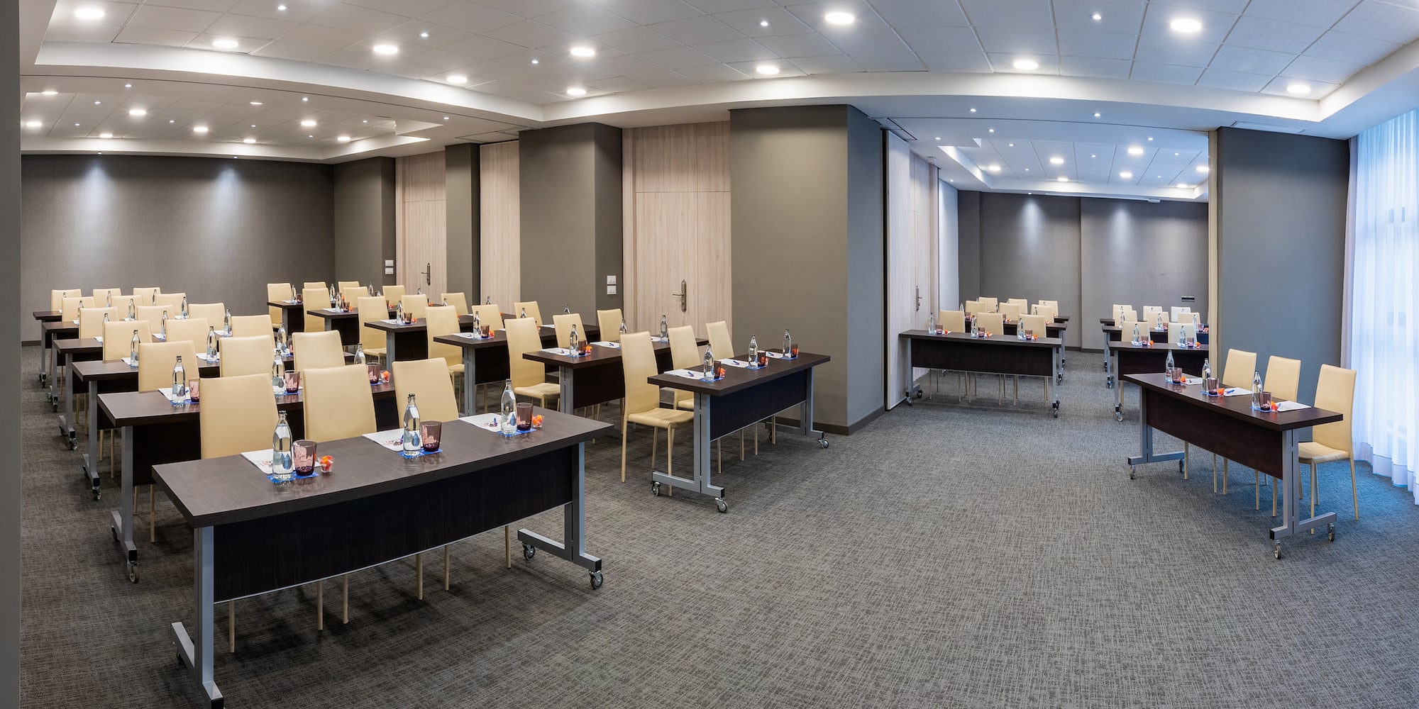 a room with tables and chairs