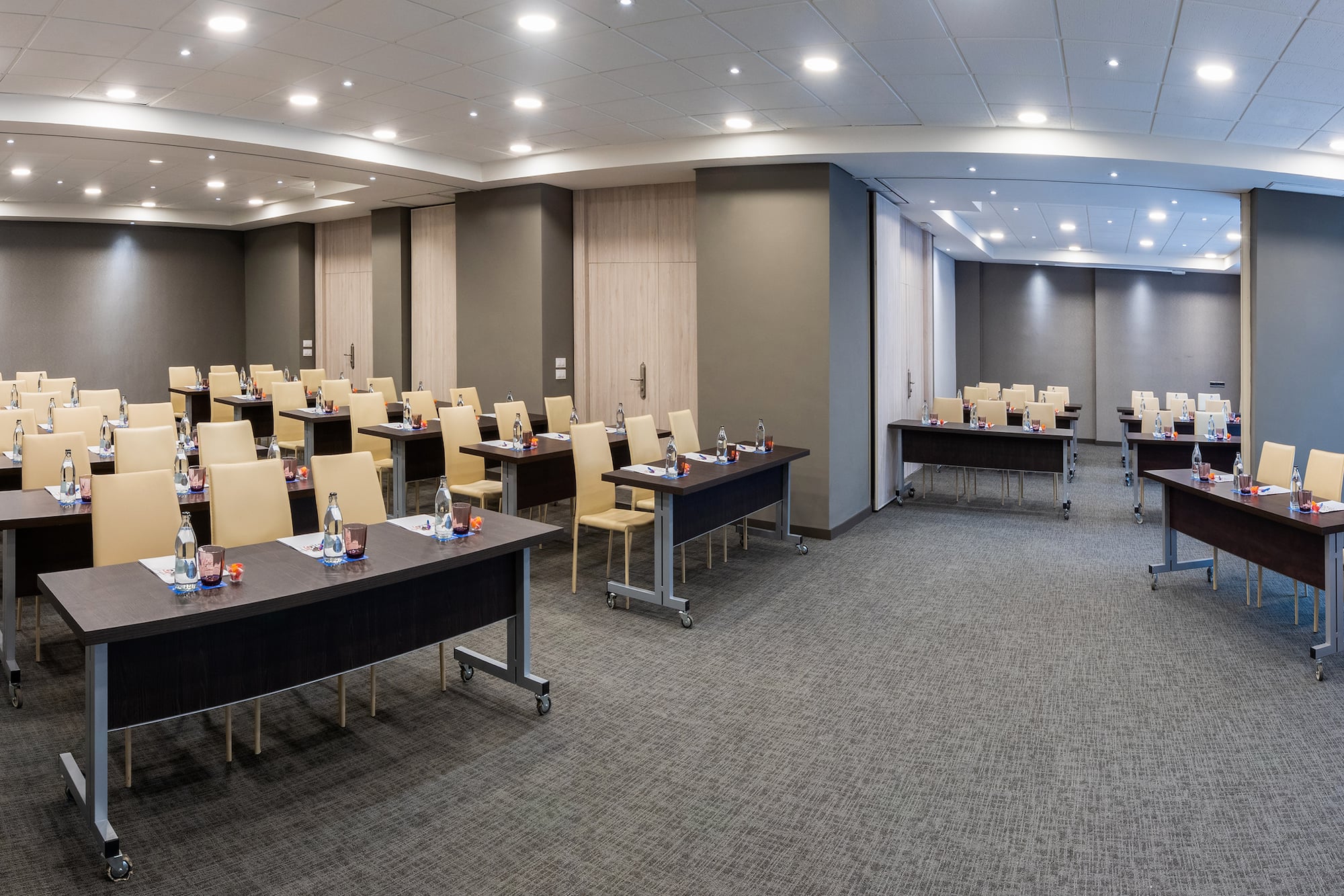 a room with tables and chairs