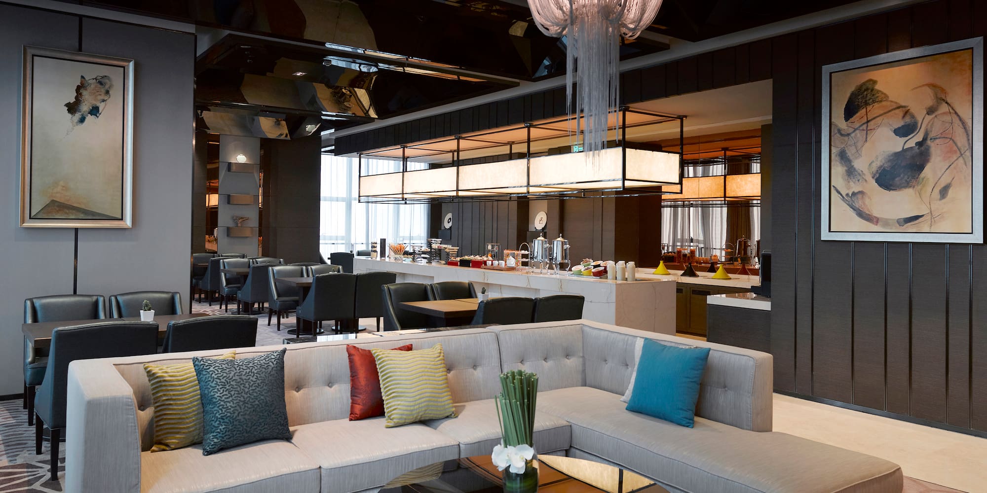 a room with couches and tables