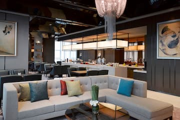 a room with couches and tables