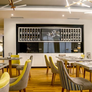 a room with tables and chairs