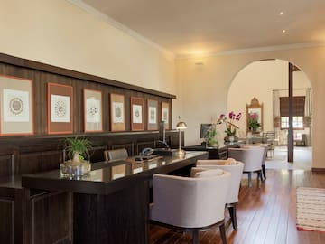 a room with a table and chairs