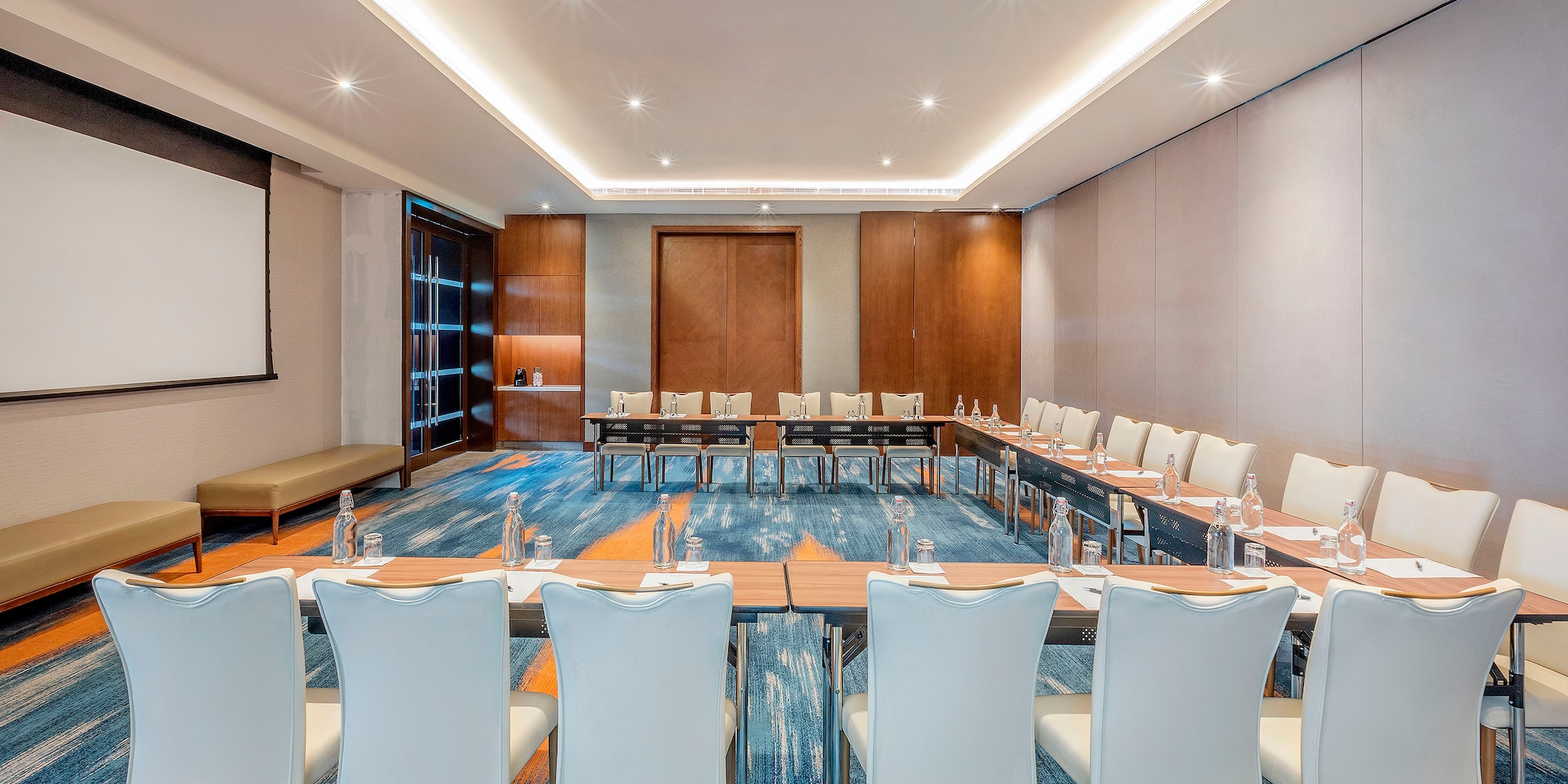 a room with tables and chairs