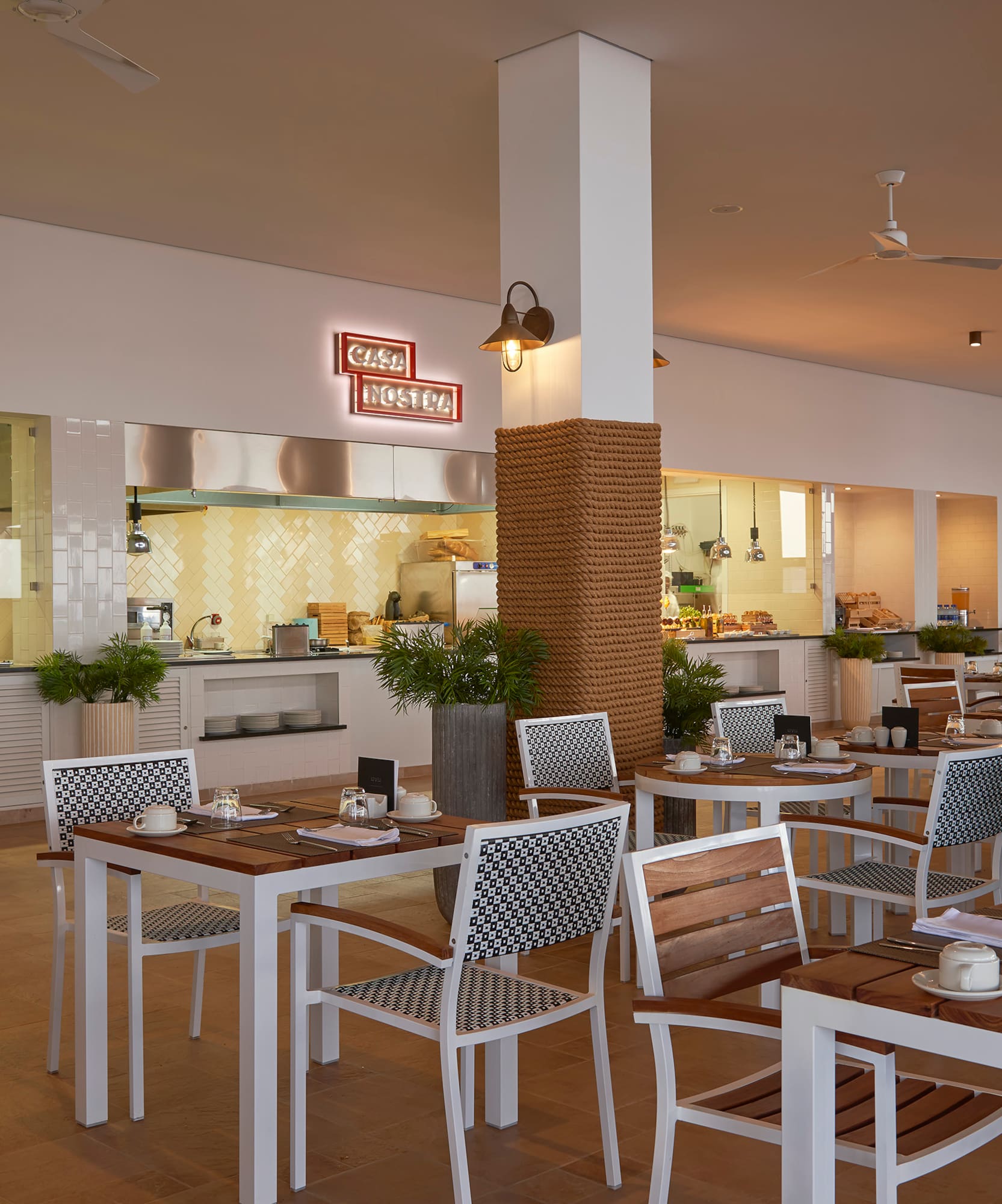 a restaurant with tables and chairs