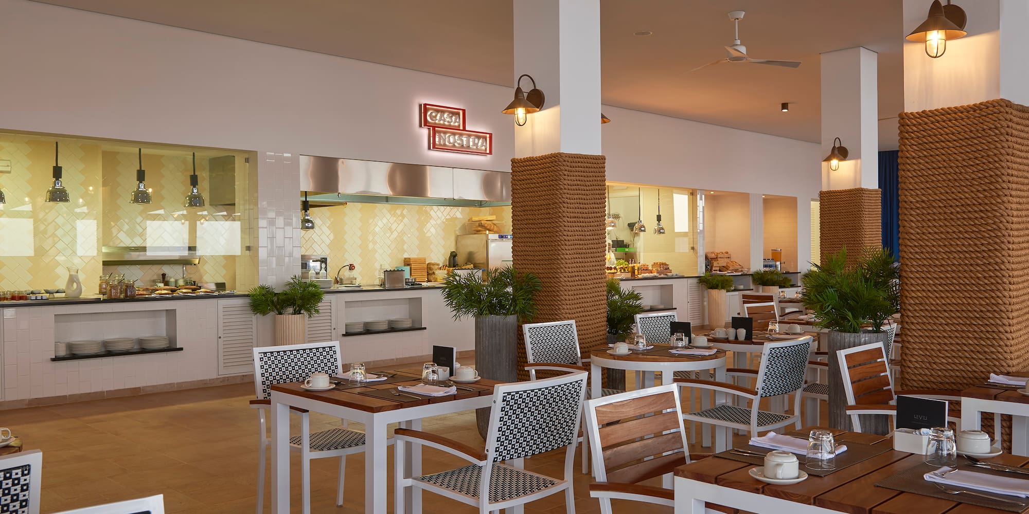 a restaurant with tables and chairs