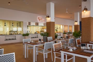 a restaurant with tables and chairs