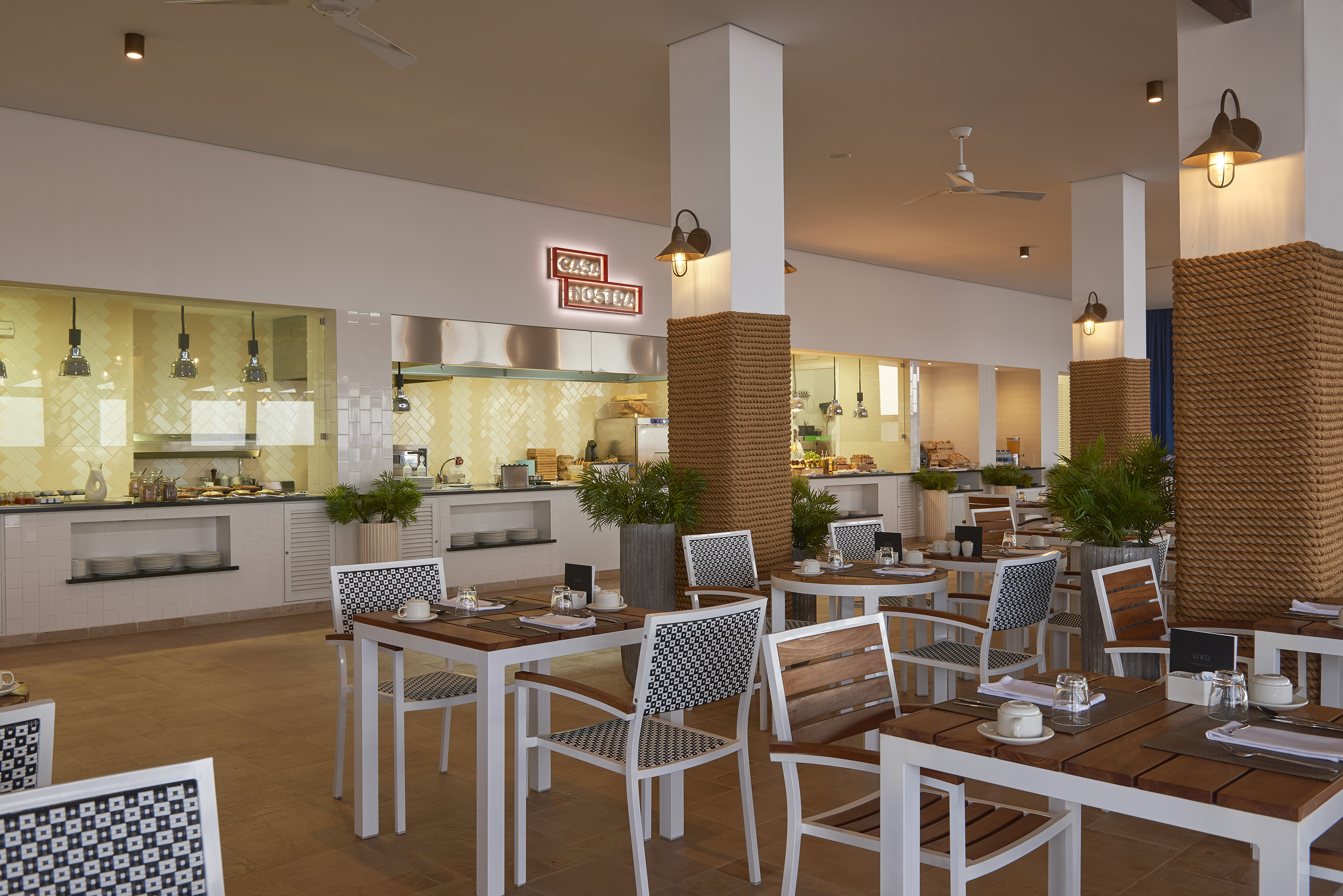 a restaurant with tables and chairs