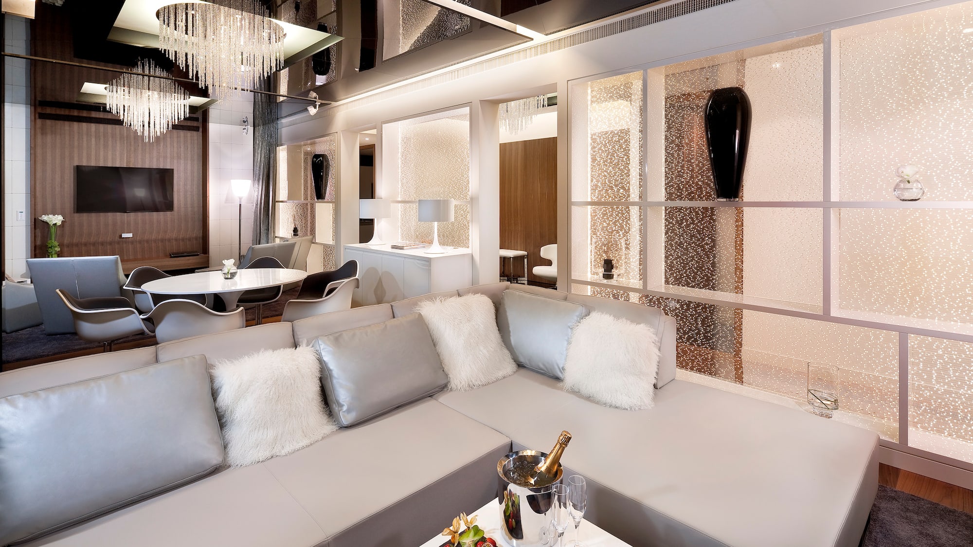 a room with a large couch and a table