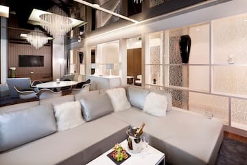 a room with a large couch and a table