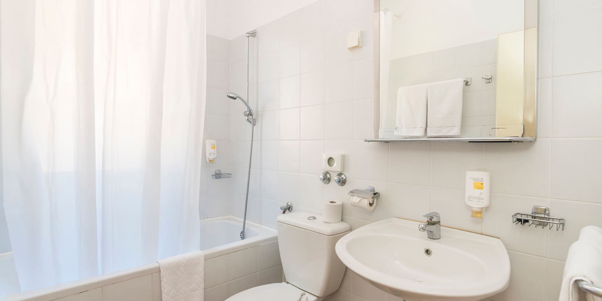 a bathroom with a sink and toilet