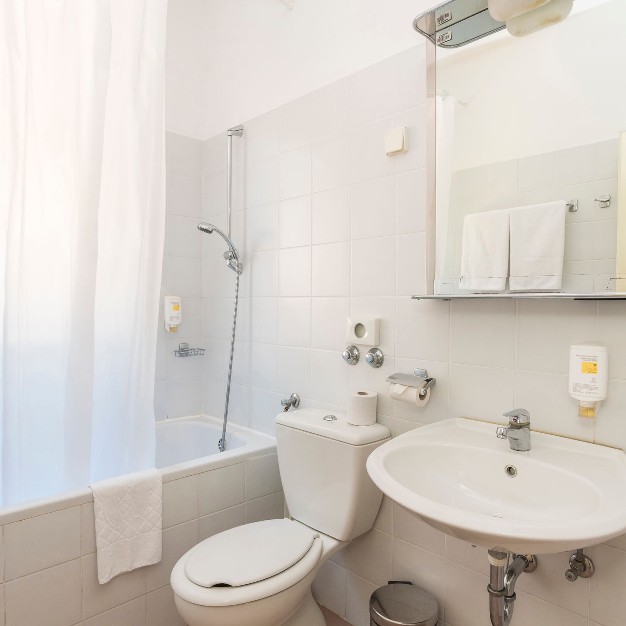 a bathroom with a sink and toilet