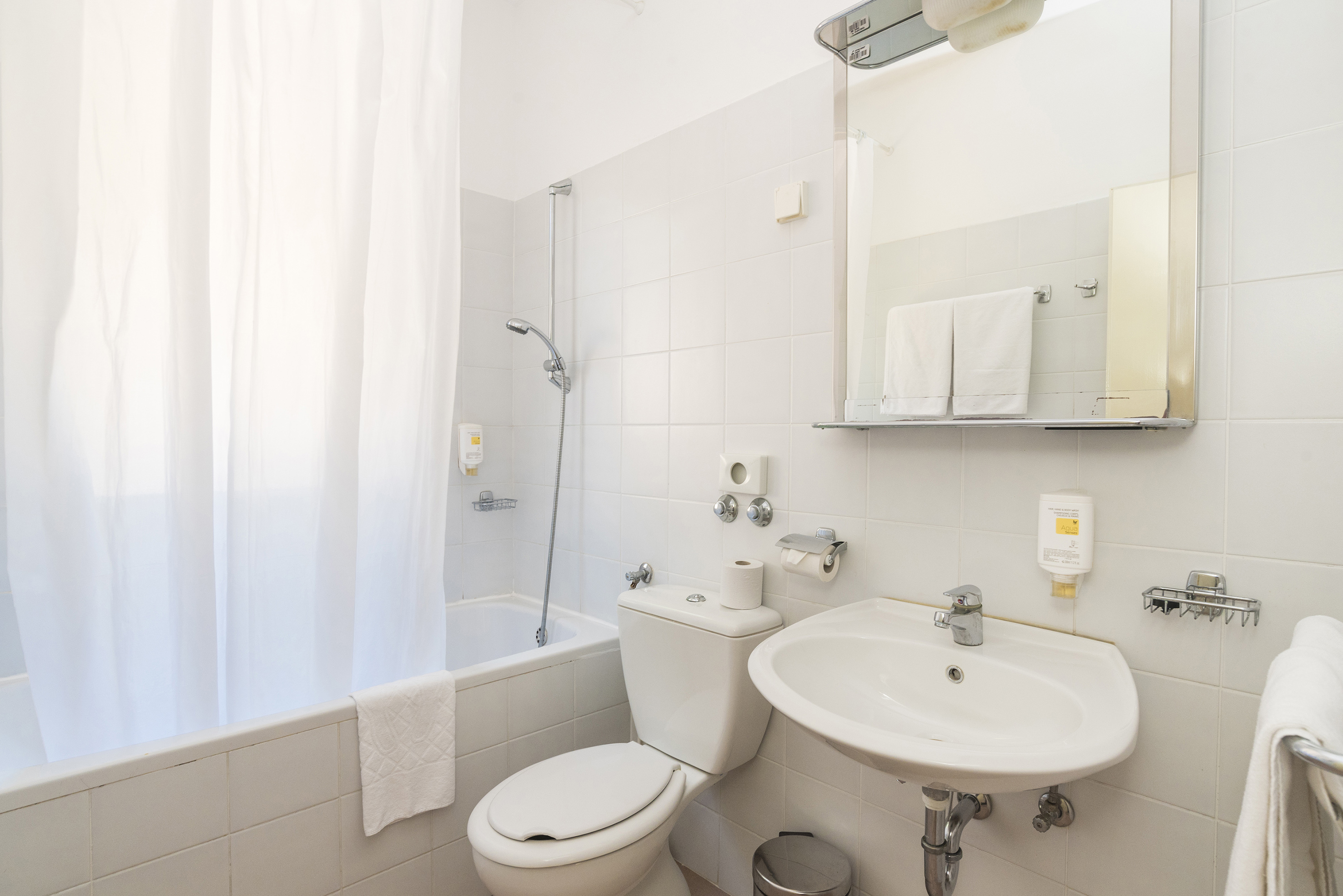 a bathroom with a sink and toilet