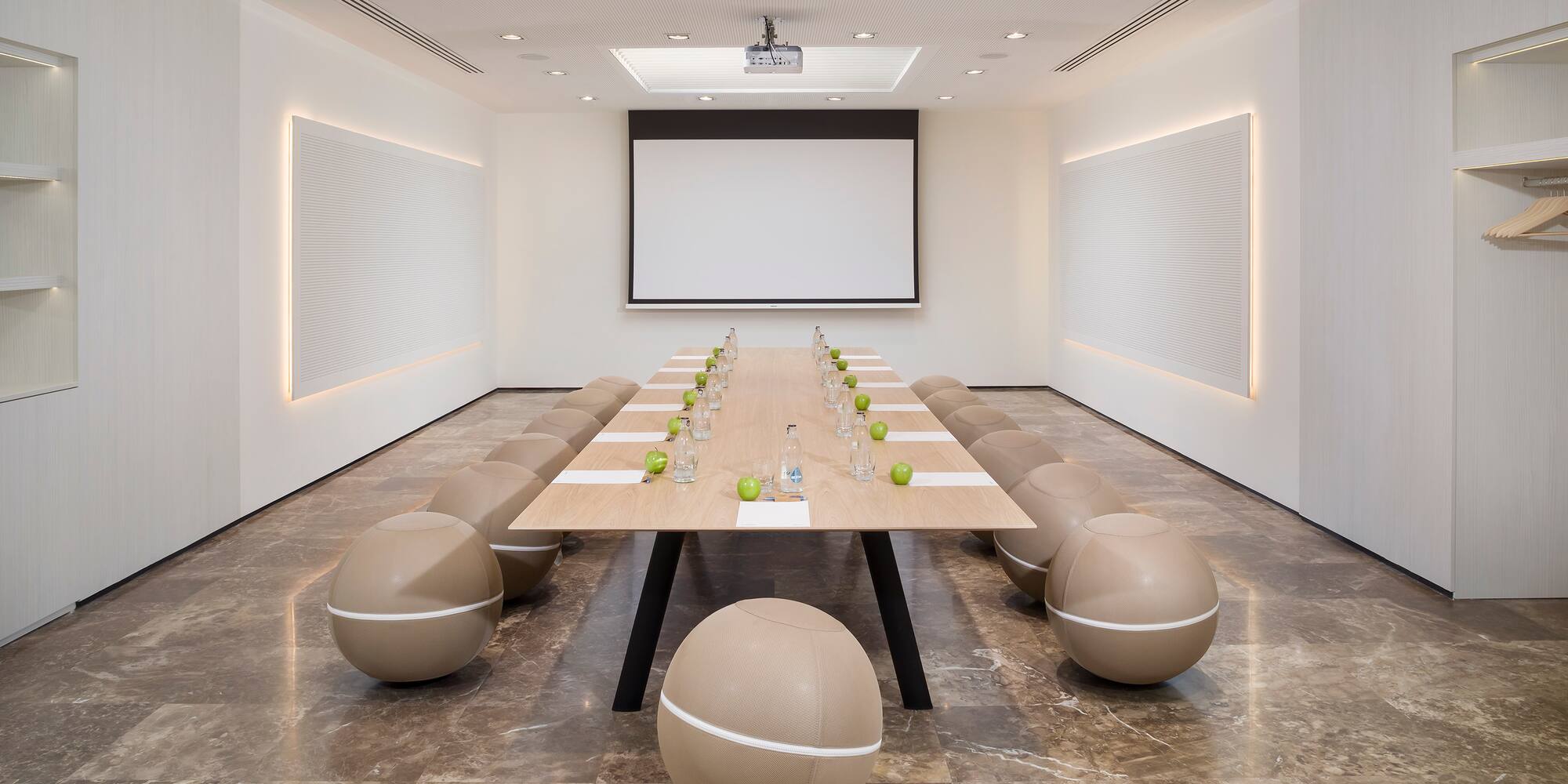 a room with a table and chairs