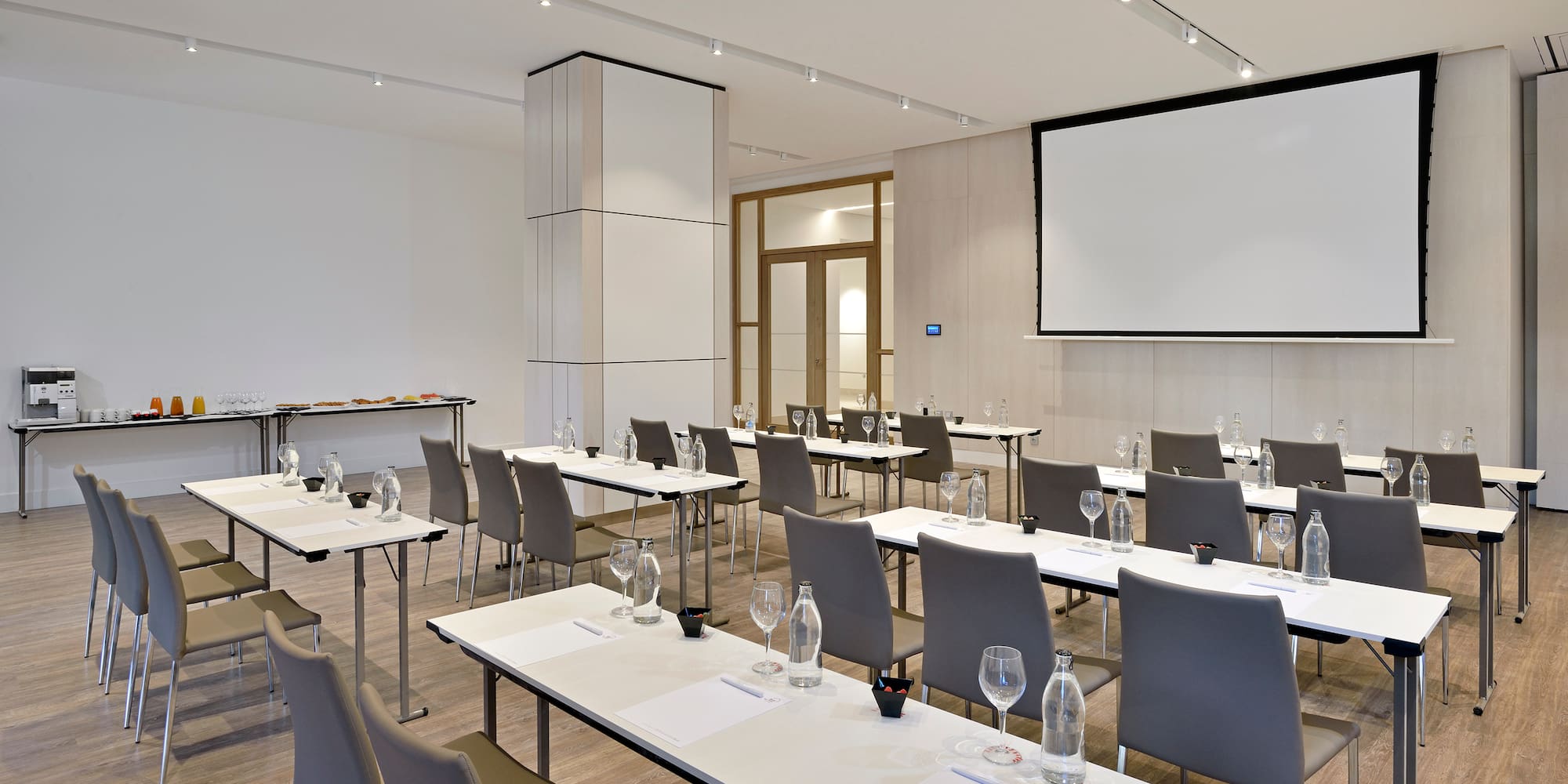 a room with tables and chairs