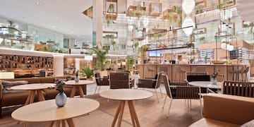 a room with tables and chairs