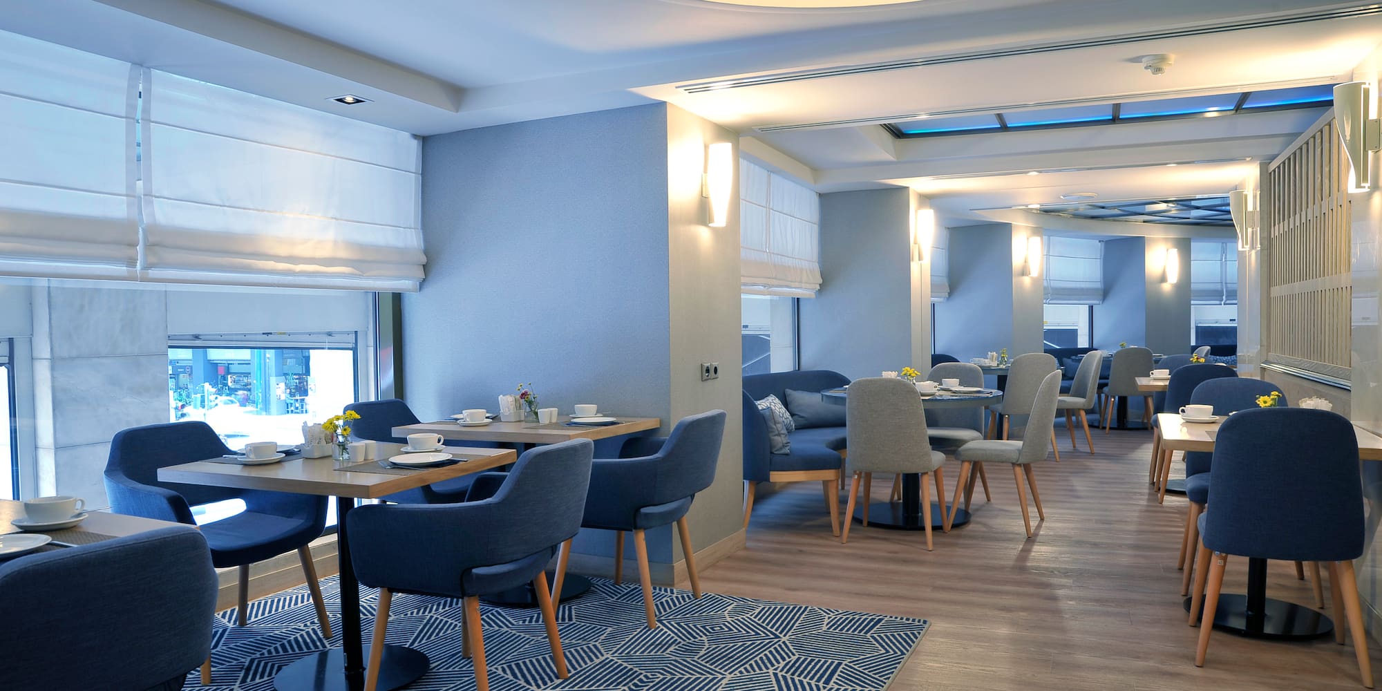 a room with tables and chairs