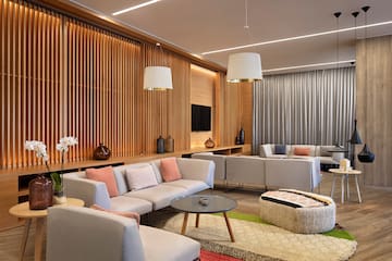 a room with couches and tables