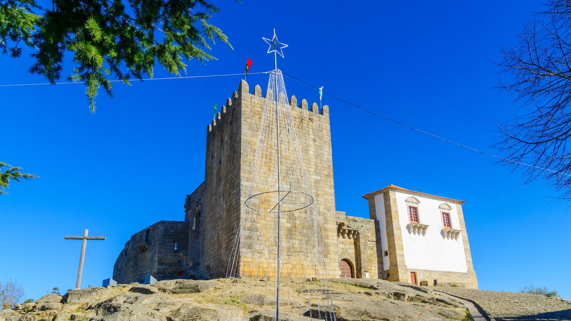 a stone castle with a star on top