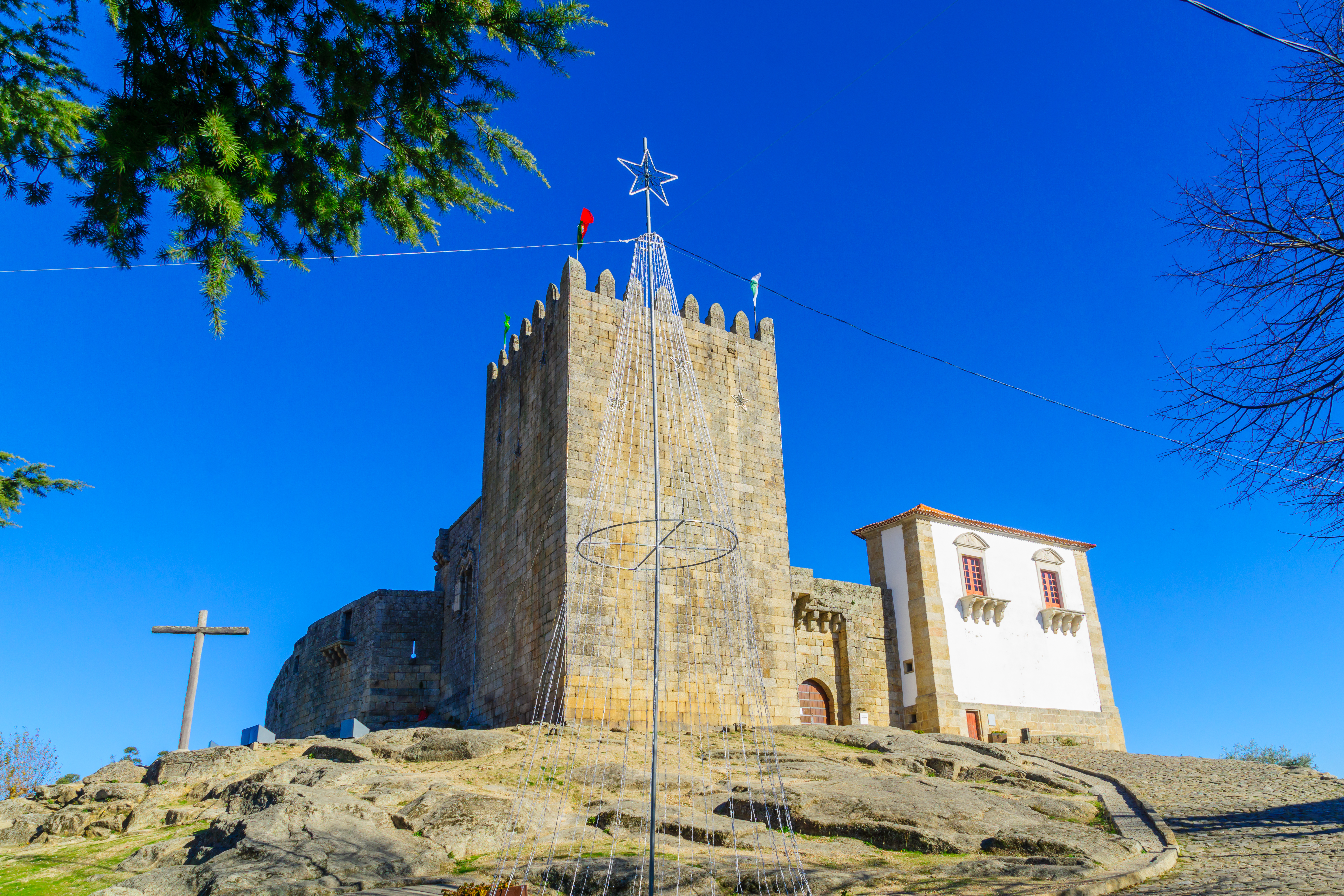 a stone castle with a star on top