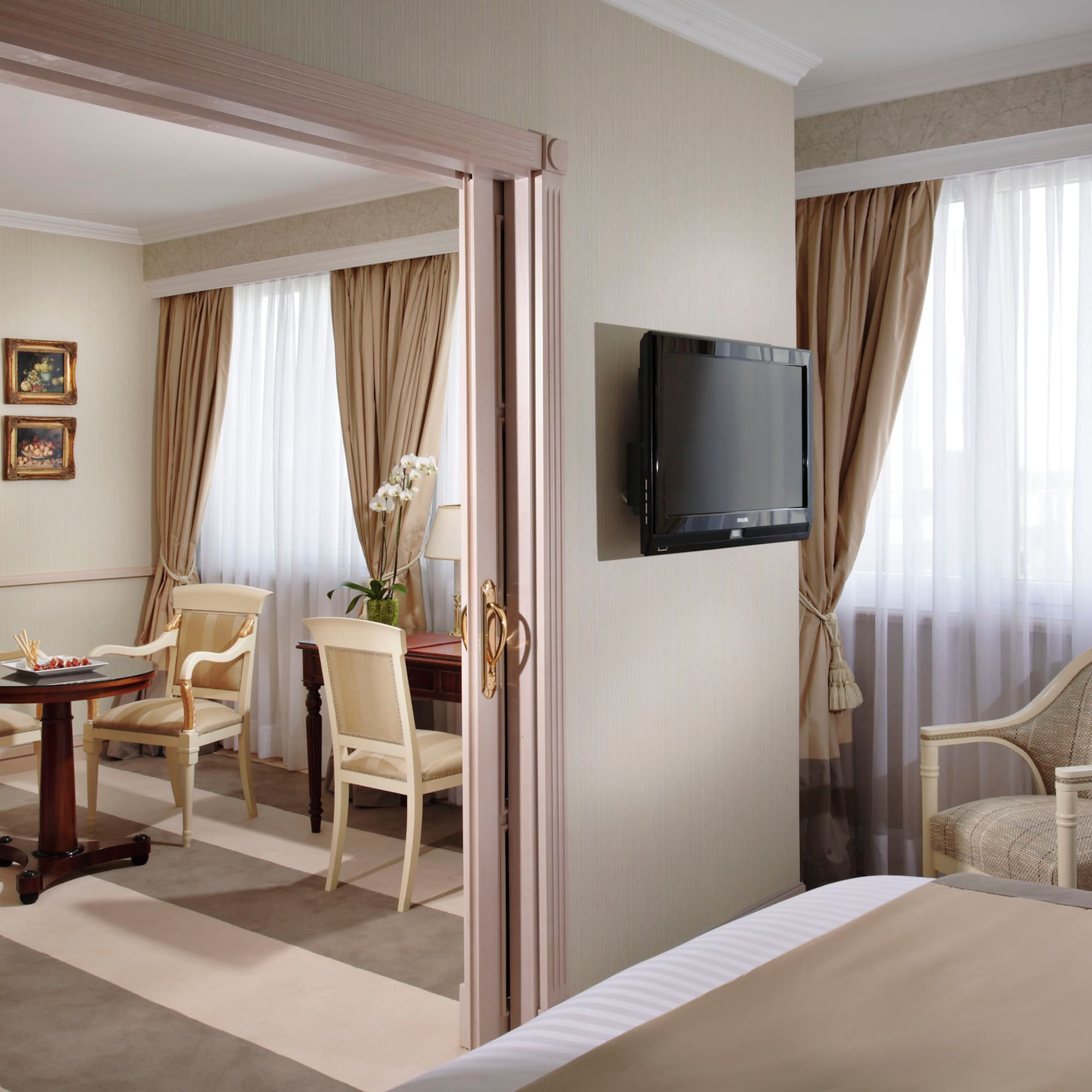 a room with a tv and a table