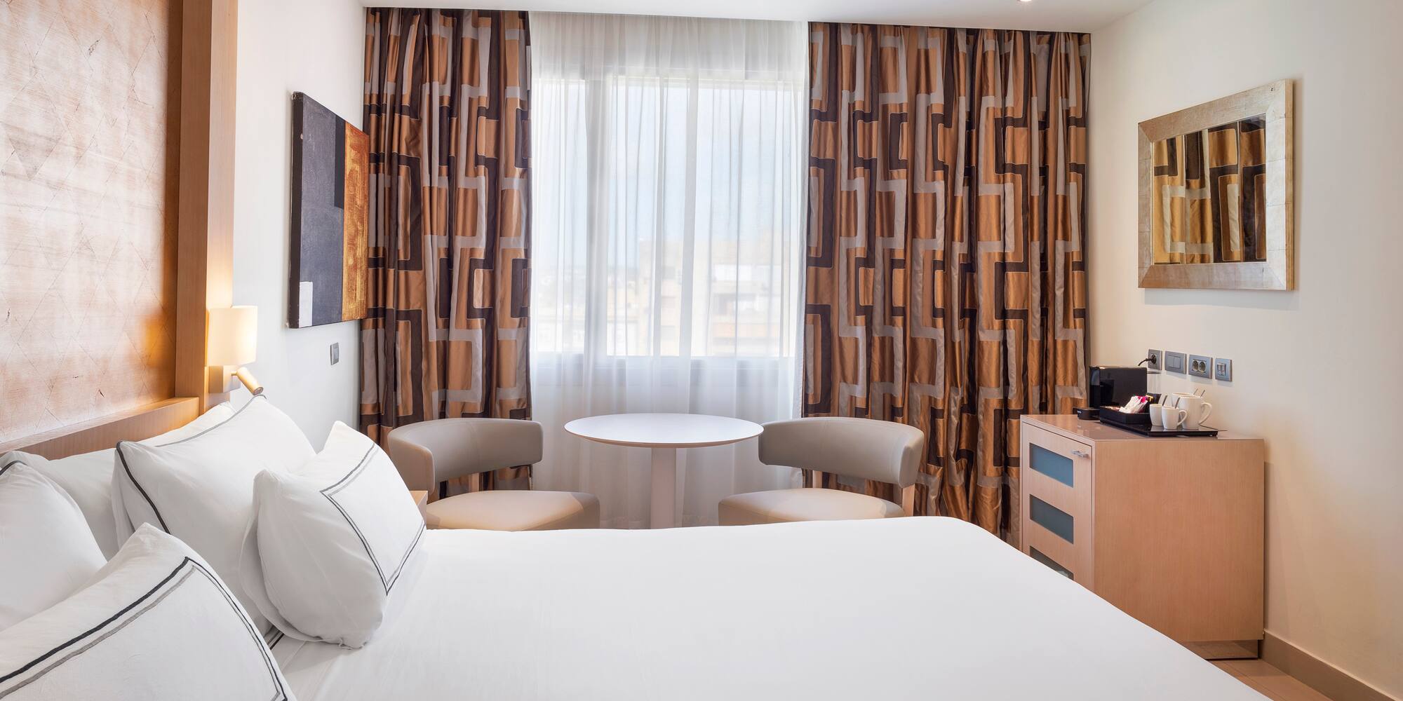 a room with a bed and a table