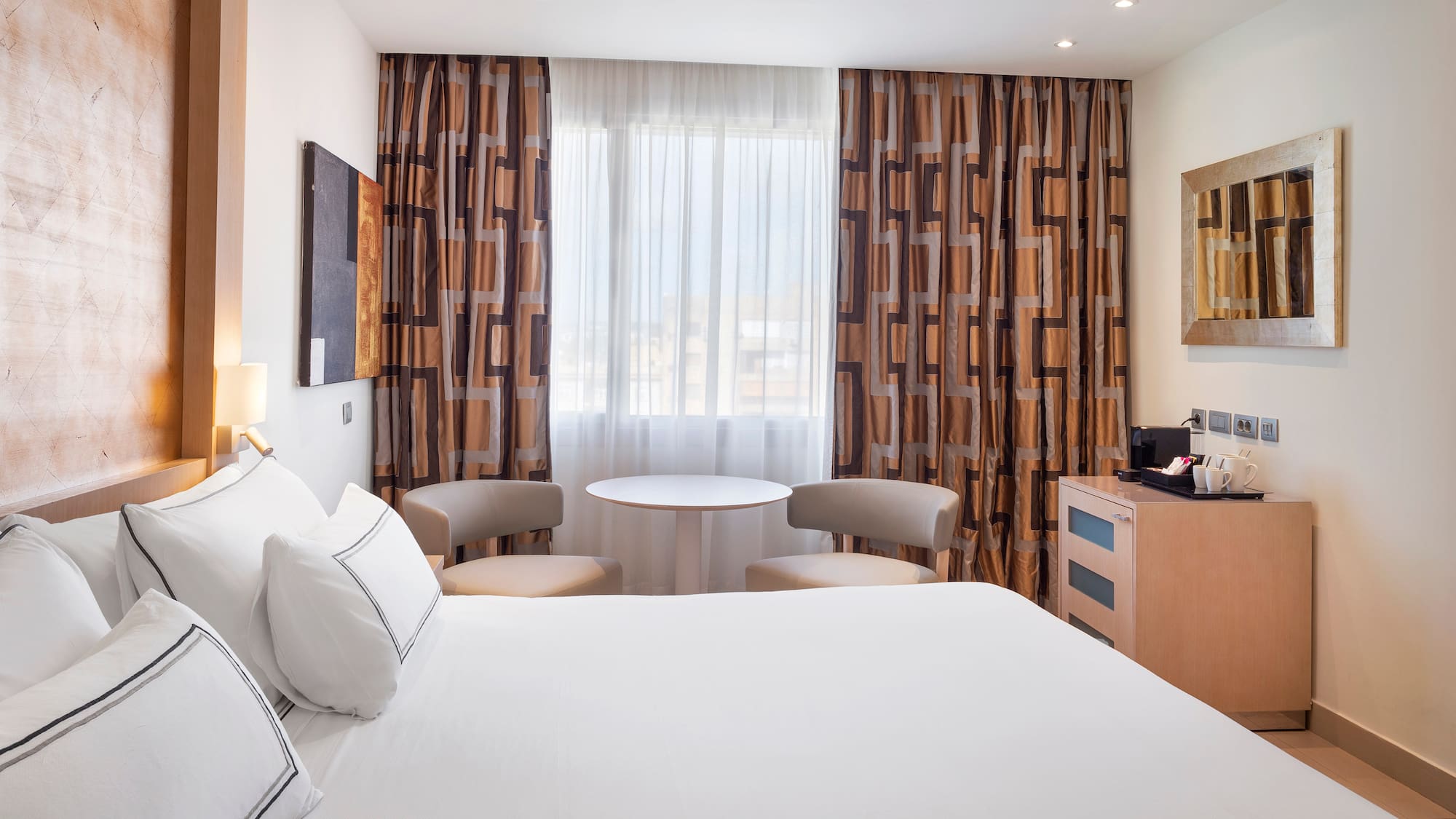 a room with a bed and a table