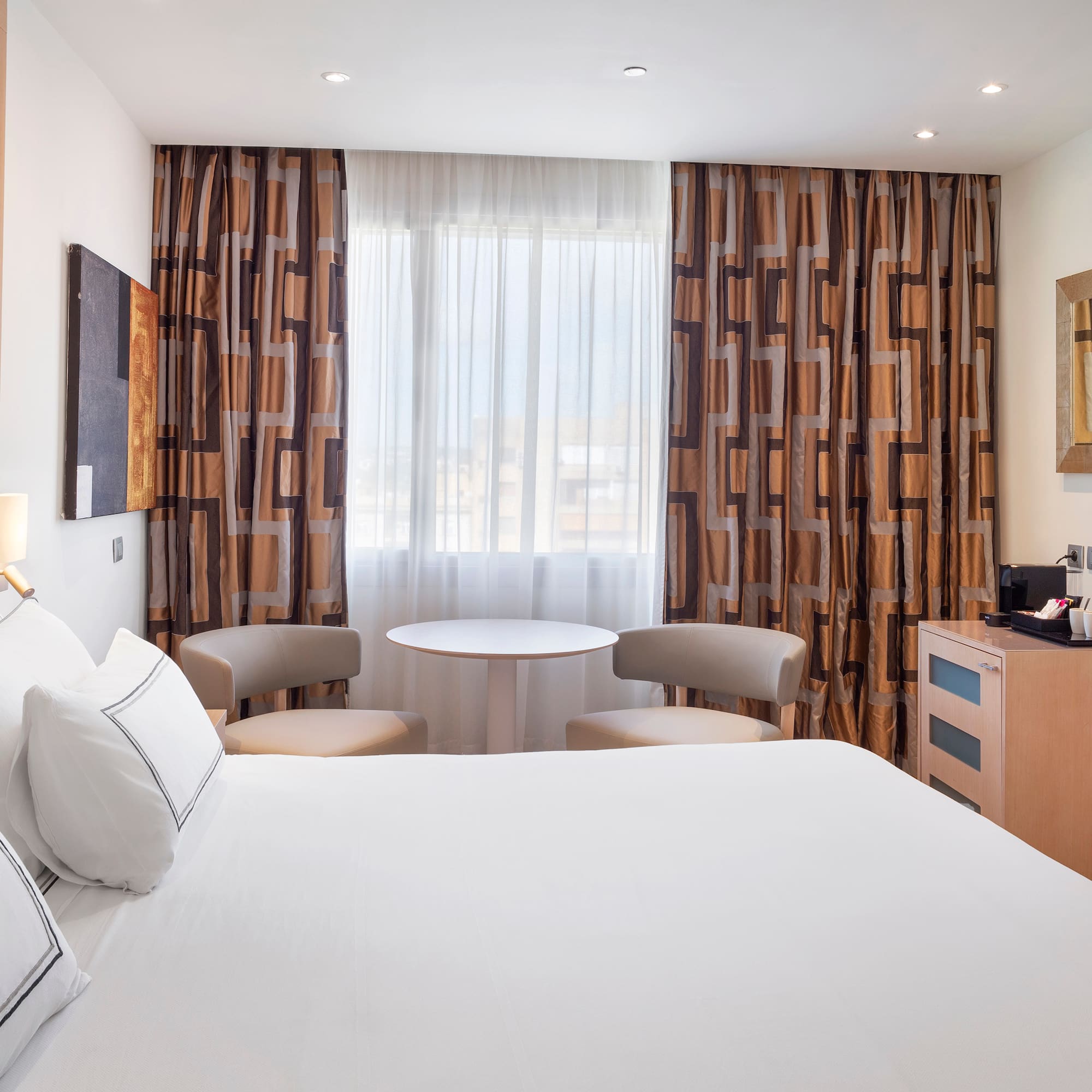 a room with a bed and a table