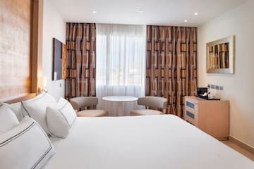 a room with a bed and a table