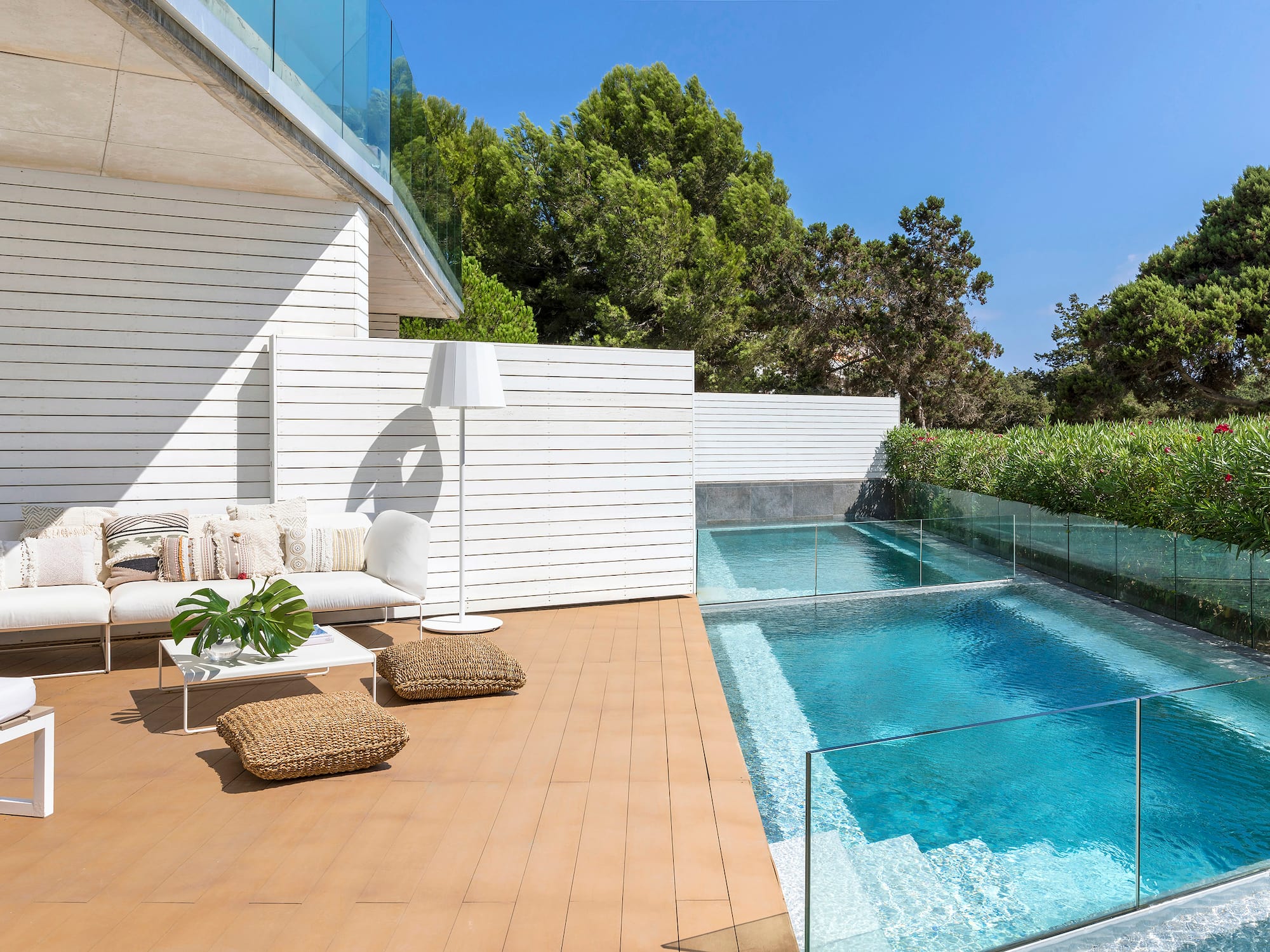 a swimming pool and a white building