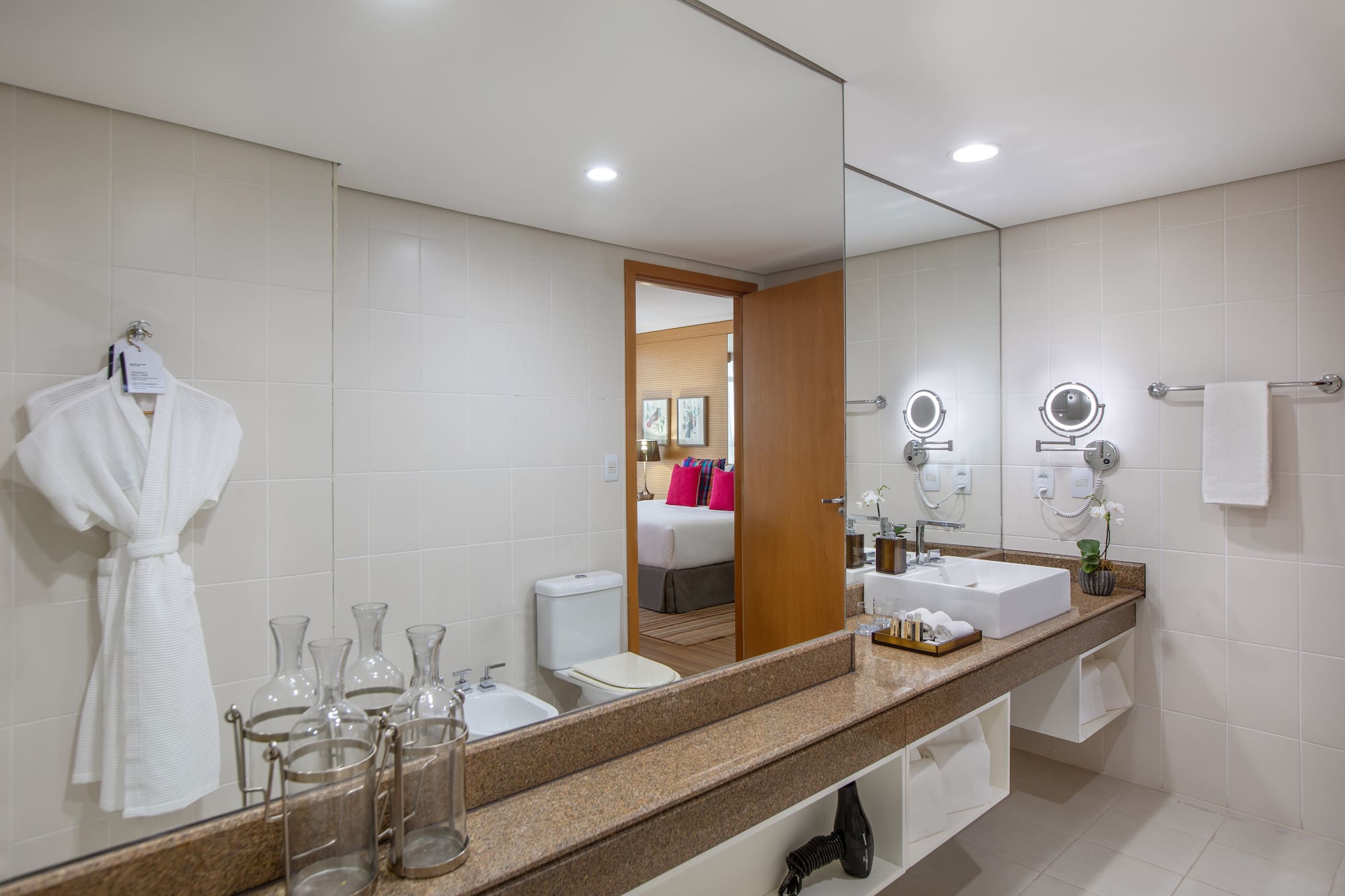 a bathroom with a large mirror