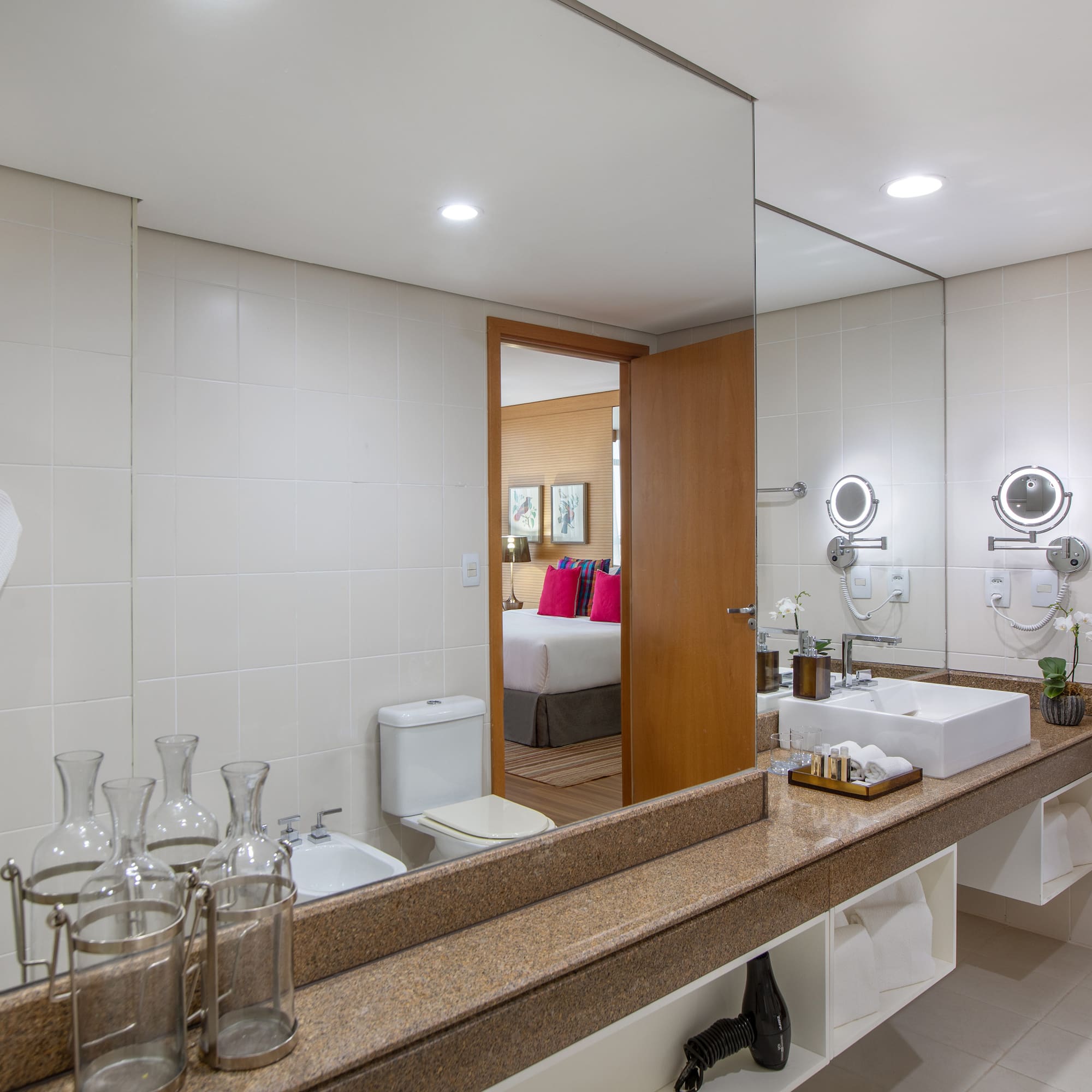 a bathroom with a large mirror