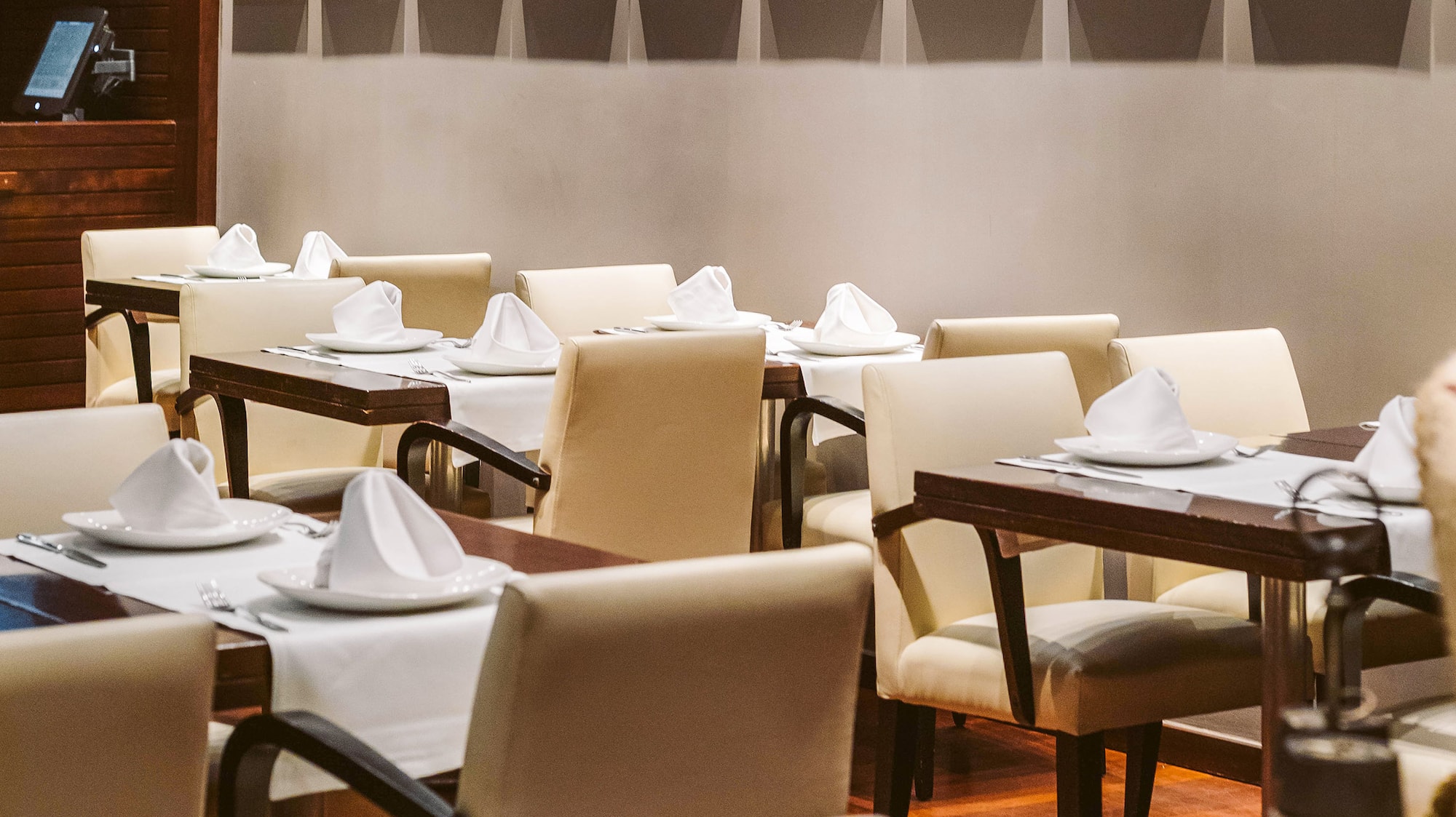 a room with tables and chairs