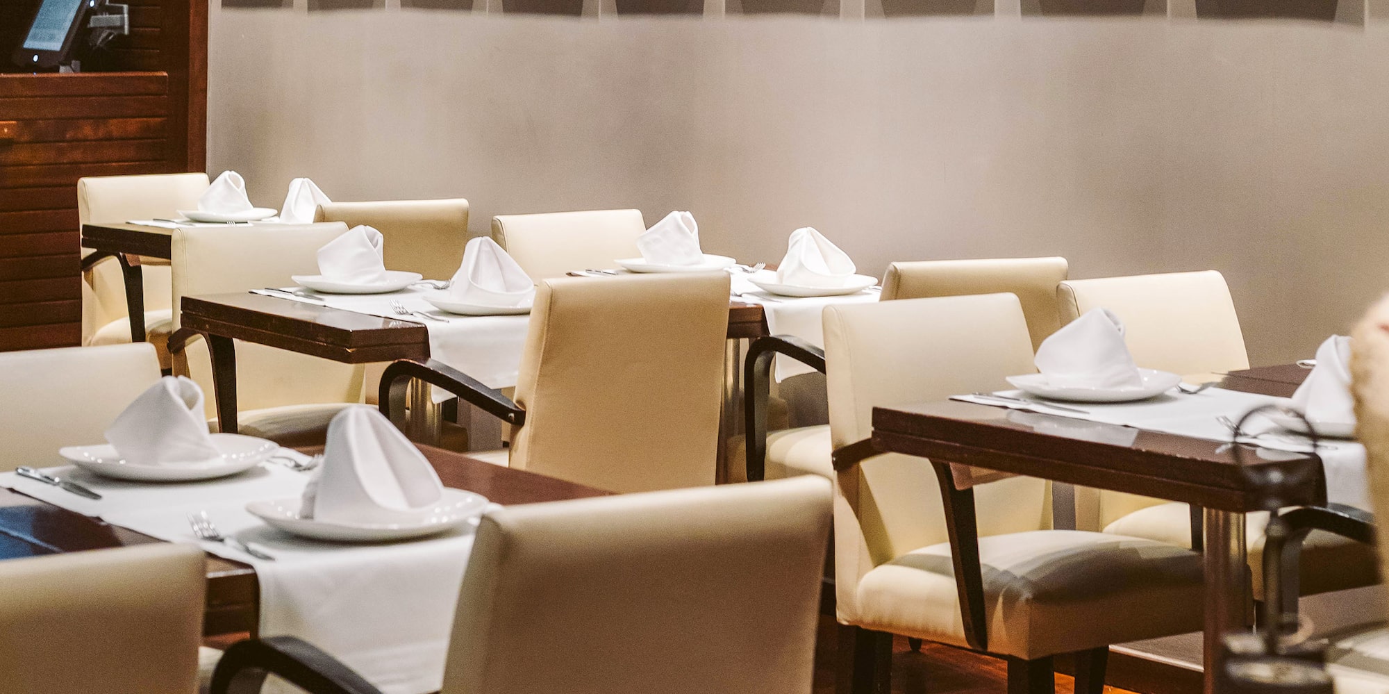 a room with tables and chairs