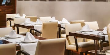 a room with tables and chairs