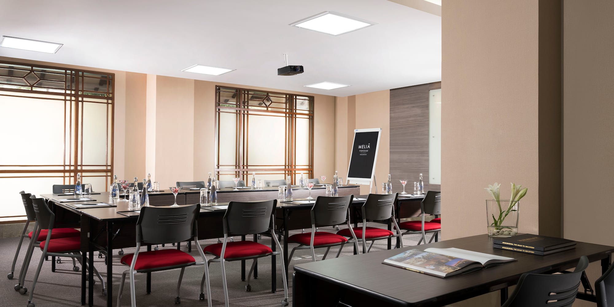 a room with a table and chairs