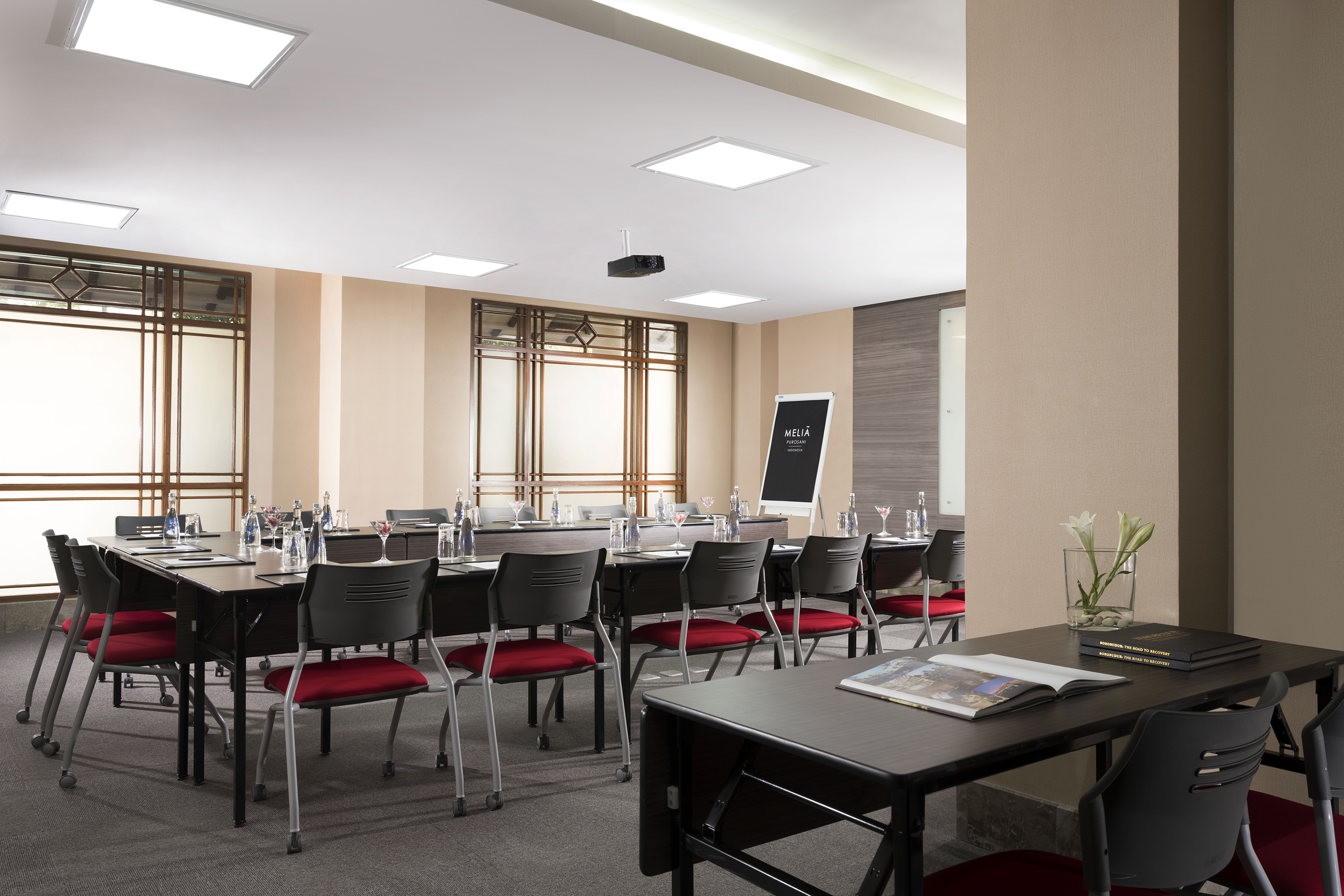 a room with a table and chairs