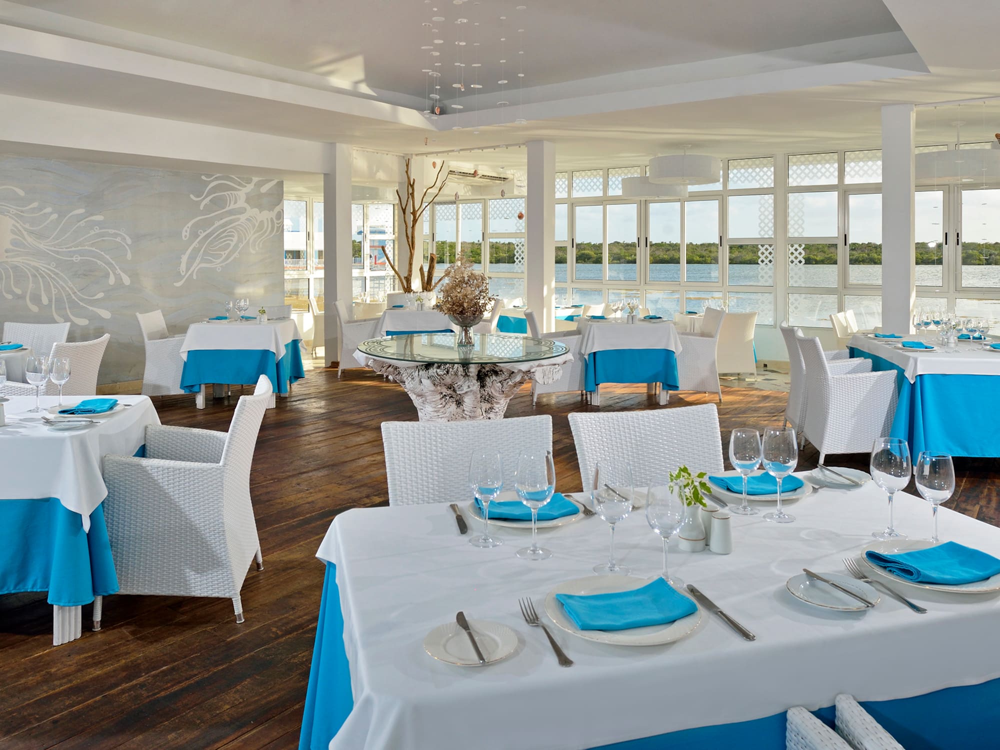 a room with tables and chairs