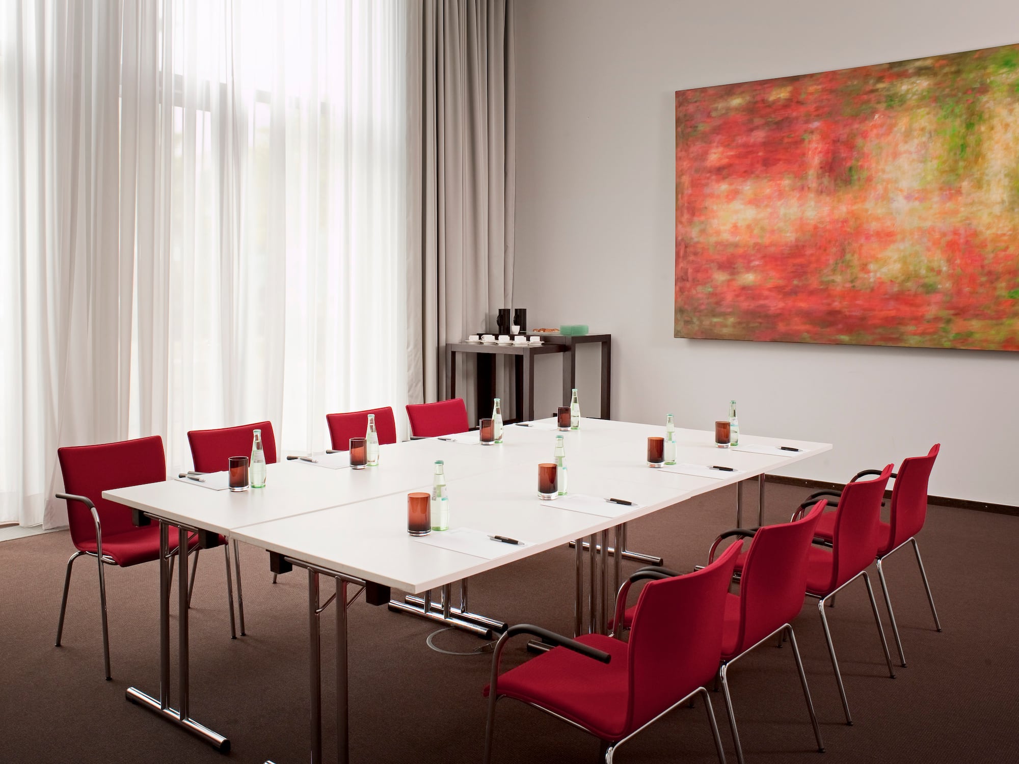 a room with a table and chairs