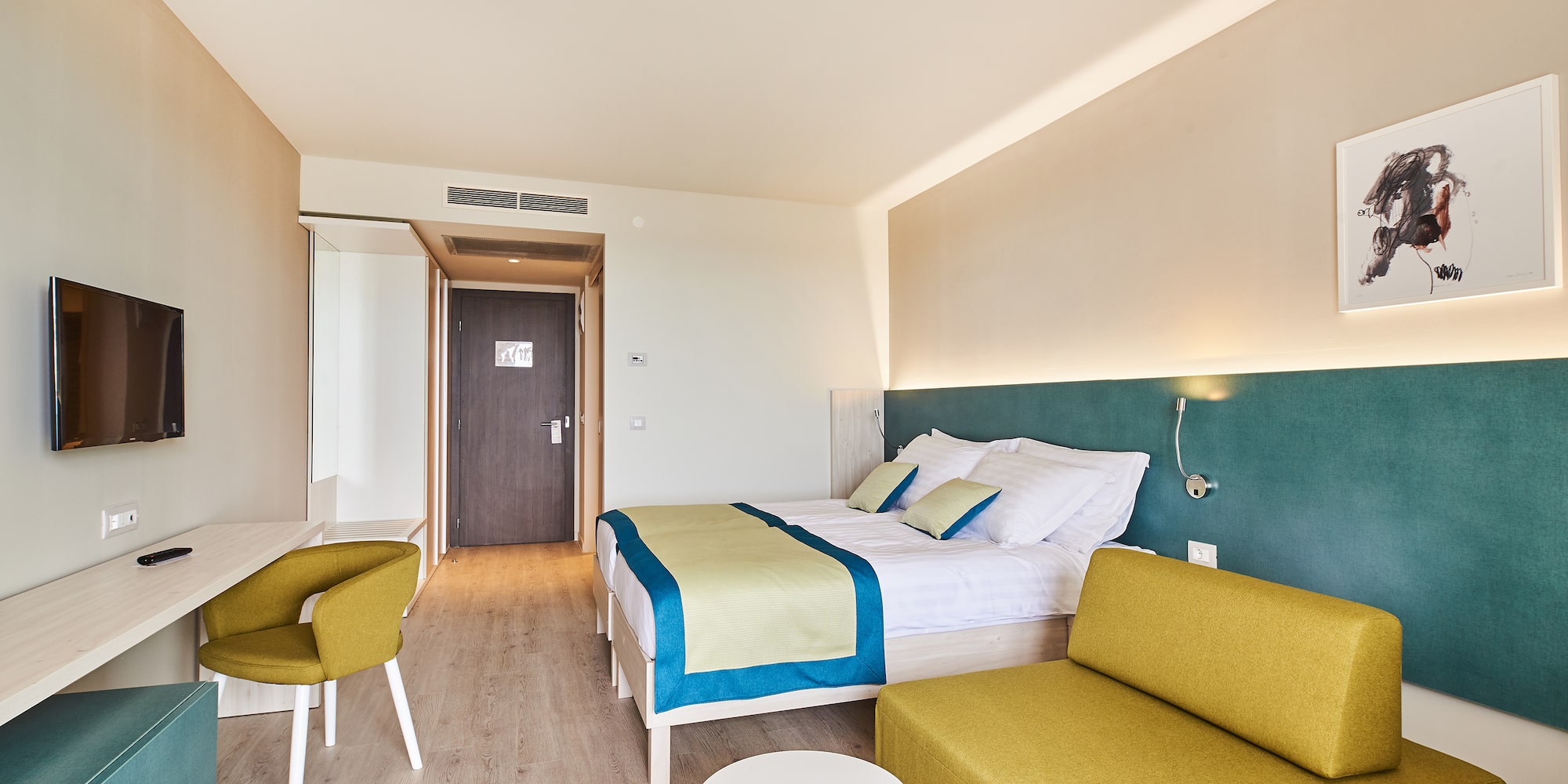 a room with a bed and a couch