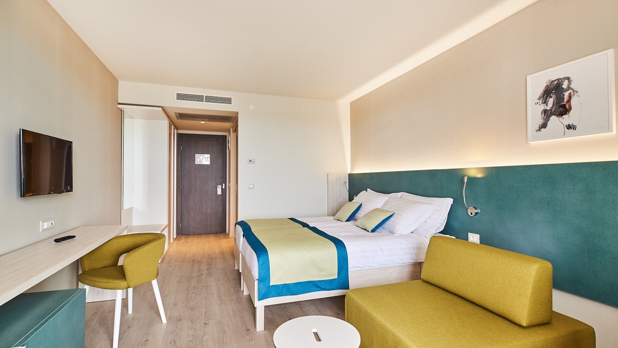 a room with a bed and a couch