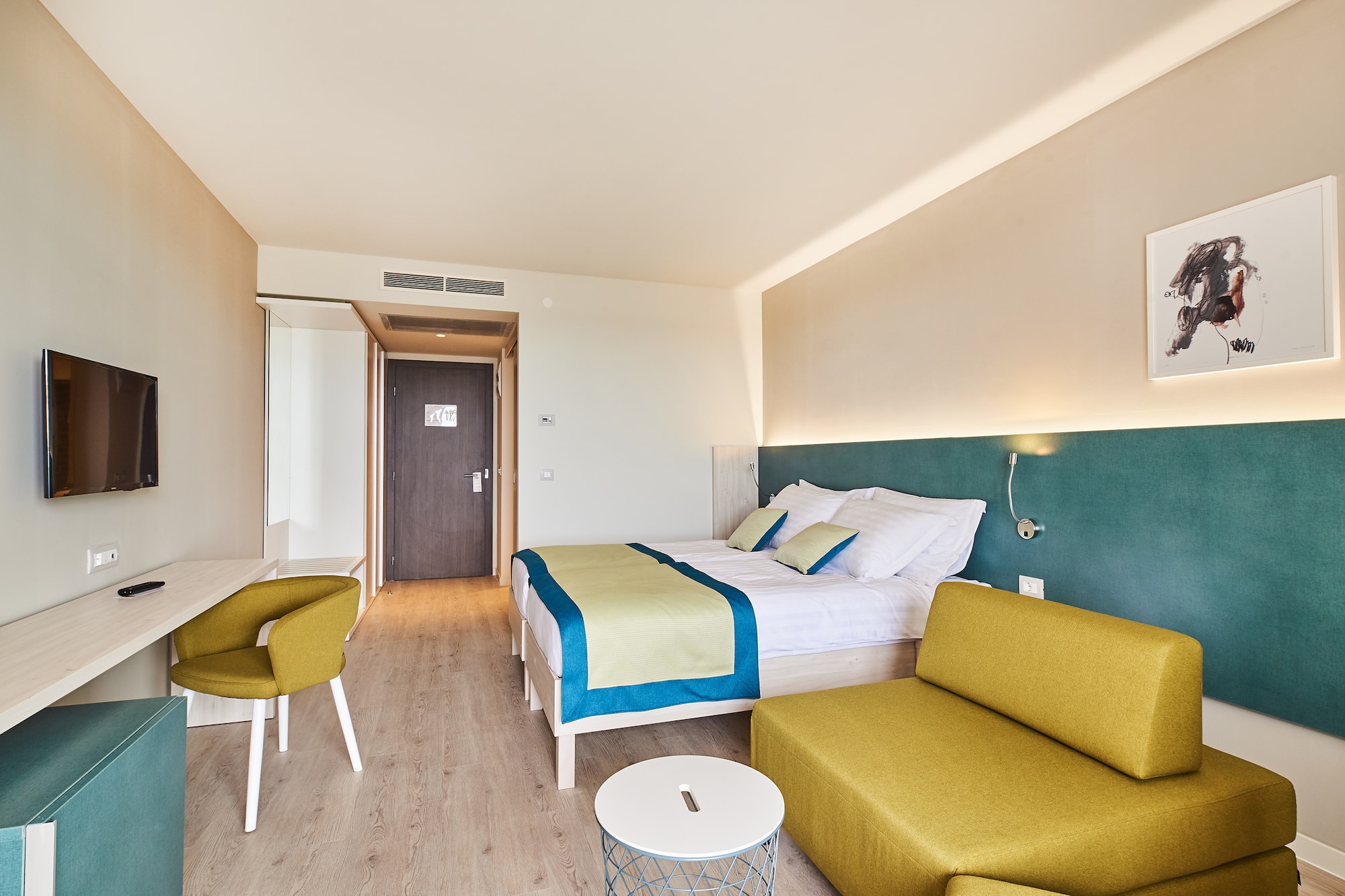 a room with a bed and a couch